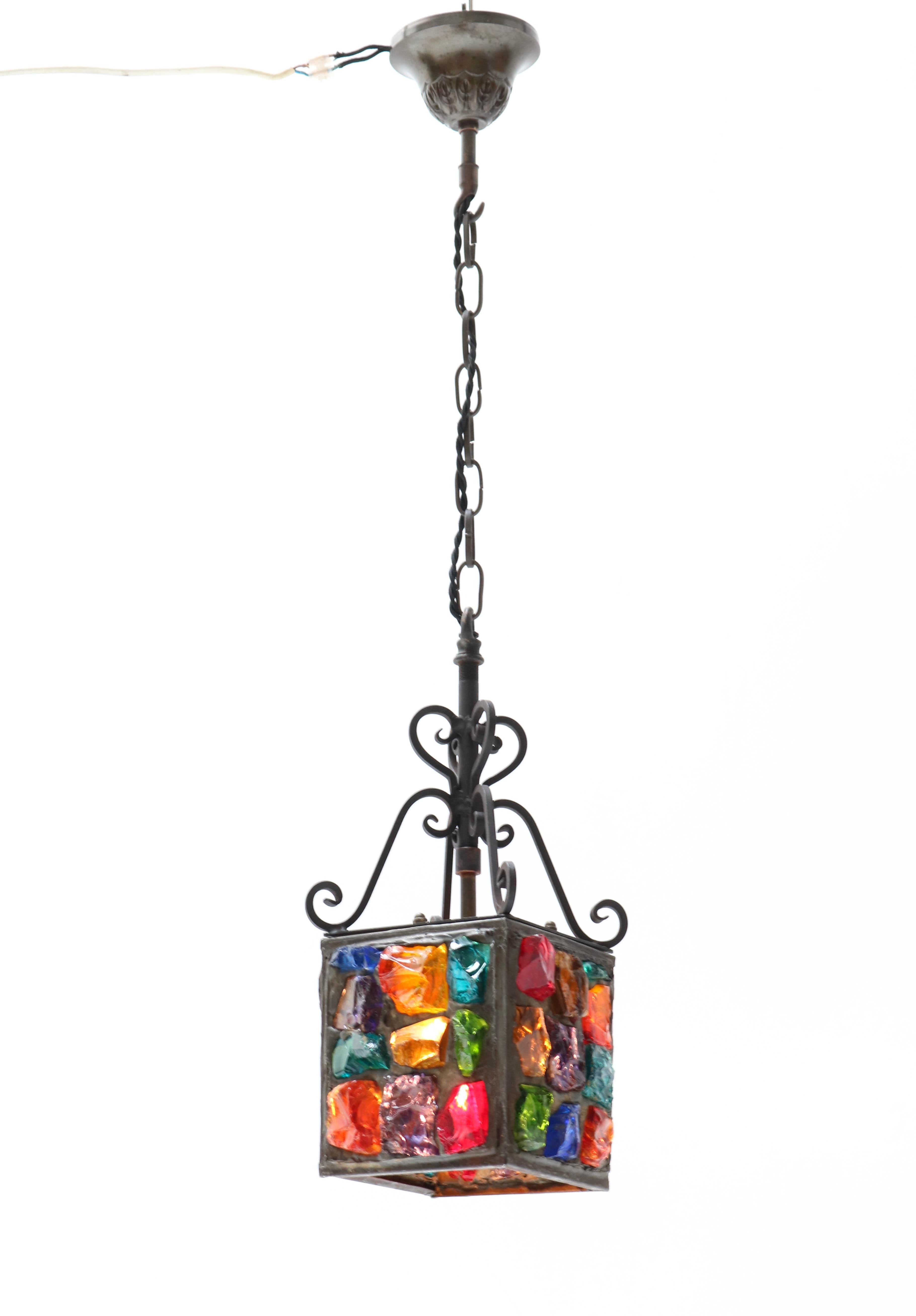 Stunning and rare Arts & Crafts Art Nouveau lantern.
Striking English design from the 1900s.
Wrought iron frame with various gemstones.
Rewired with one socket for E-27 lightbulb.
In very good condition with a beautiful patina.