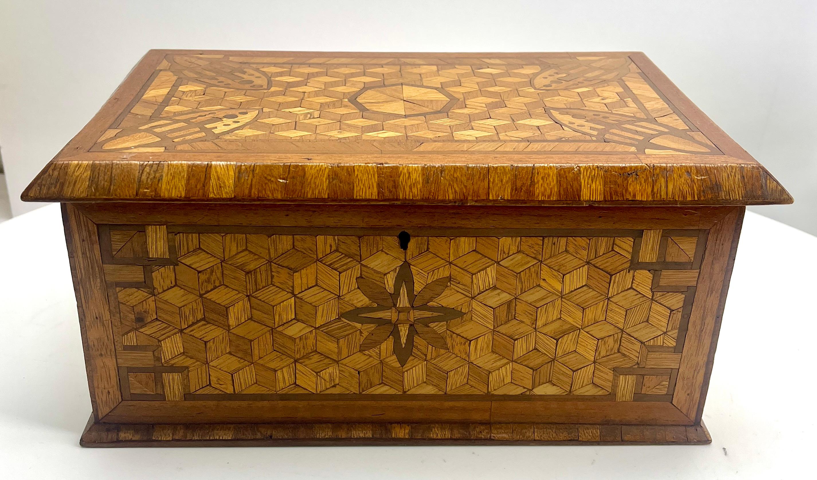 Arts & Crafts Box with Decorative Hand made marquetry Decor, circa 1910

About:
A wooden box from the Arts & Crafts period, 
Made in Austria.
Very Small piece of marketery is missing see photo
A very special item with decorative hand Made Decor.