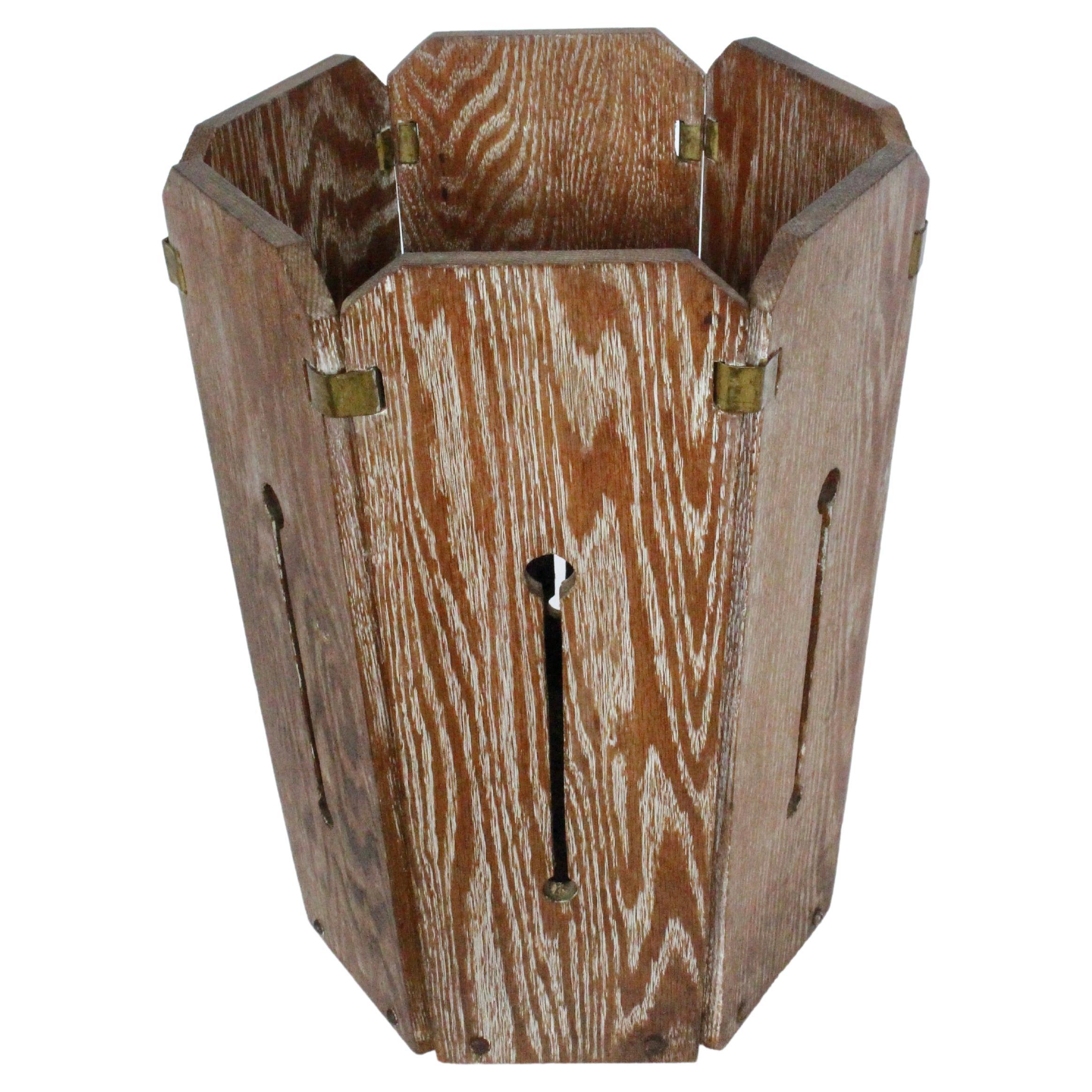 Arts & Crafts Mission Cerused Oak slat, Brass clasp hexagonal Trash Can, 1920's. Featuring a handcrafted flared form, quarter sawn oak slat construction, stick and ball cut out ,silhouette detail, with Brass clips to top and screws to lower and