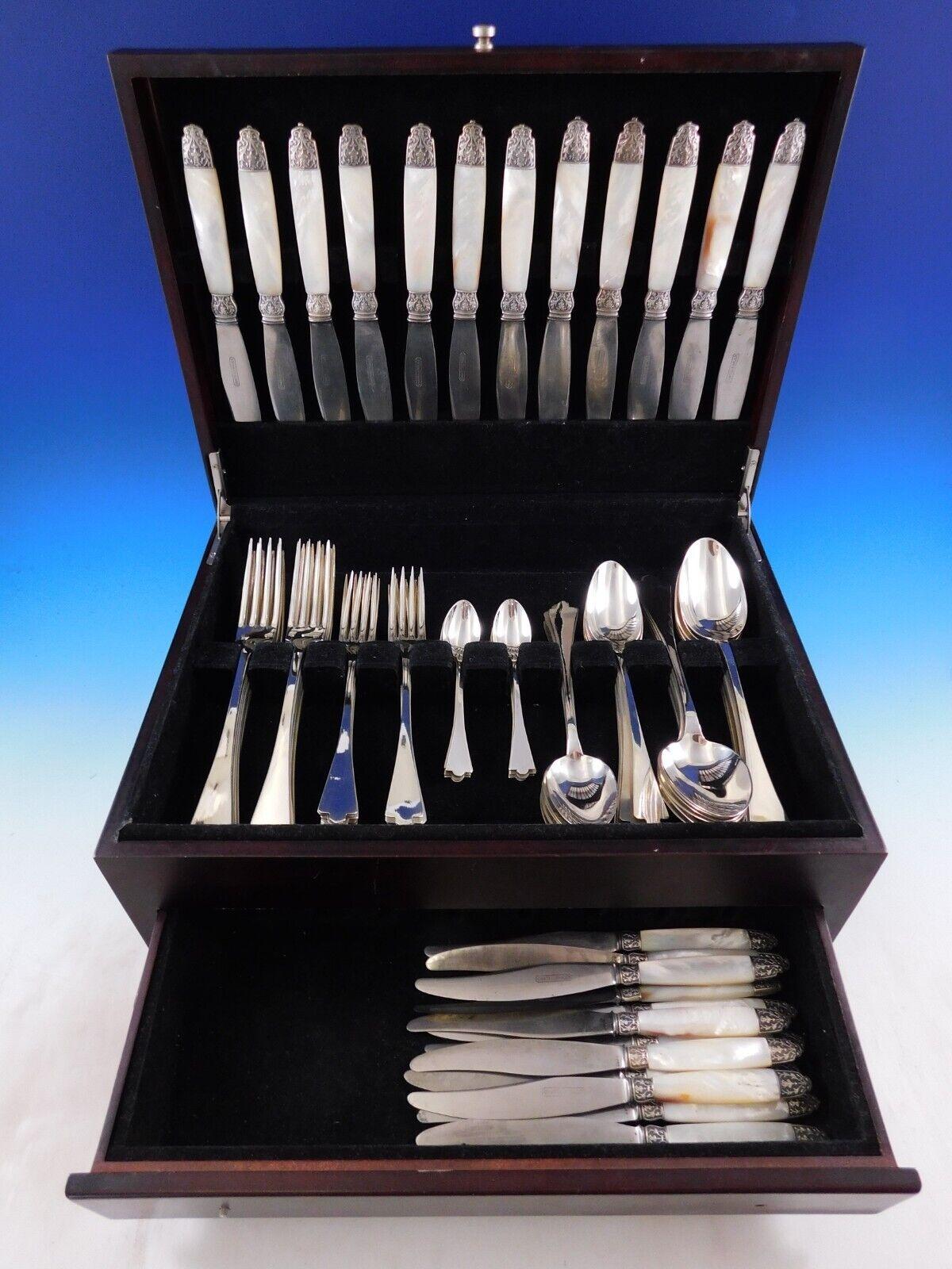 Incredible 950 French silver flatware service in Arts and Crafts style by Albert Joseph Ernest Calle and son Andre Calle - 84 pieces. This flatware service features engraved arts and crafts design on the reverse. It is a hand wrought pattern with