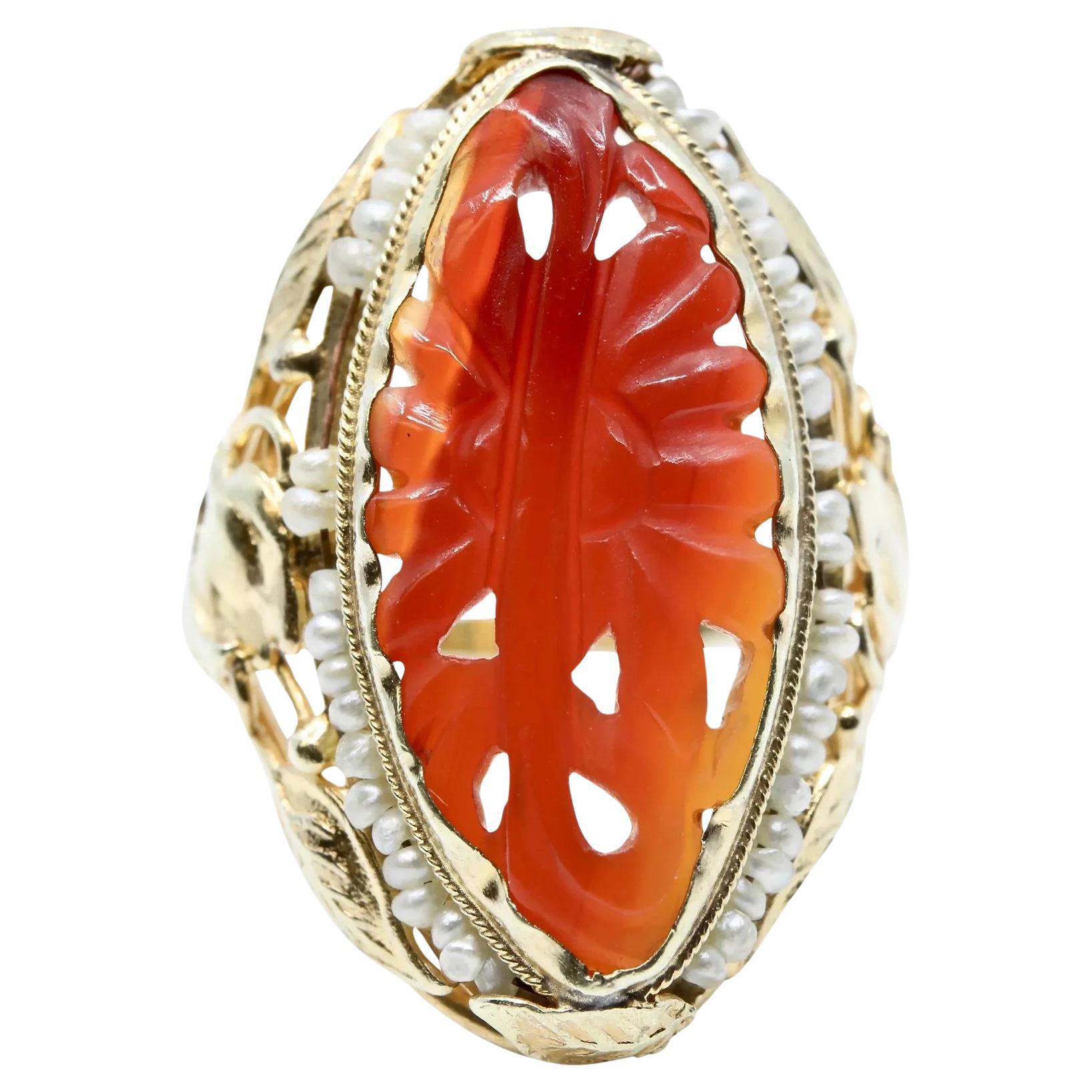 Arts & Crafts Carved Carnelian and Pearl Ring in 14K Yellow Gold