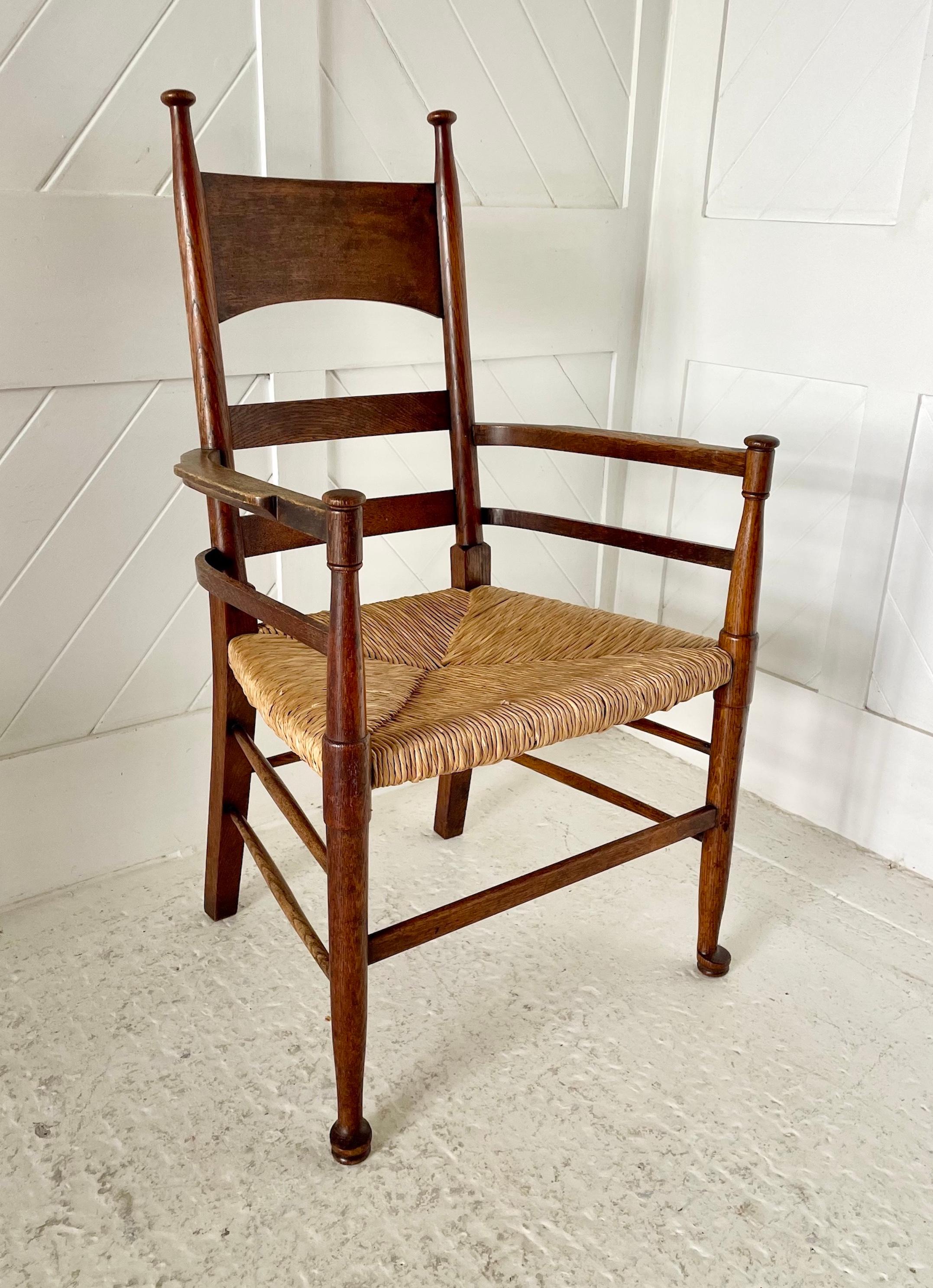 Arts & Crafts oak carver chair
With rush seat
By William Birch
Circa 1900