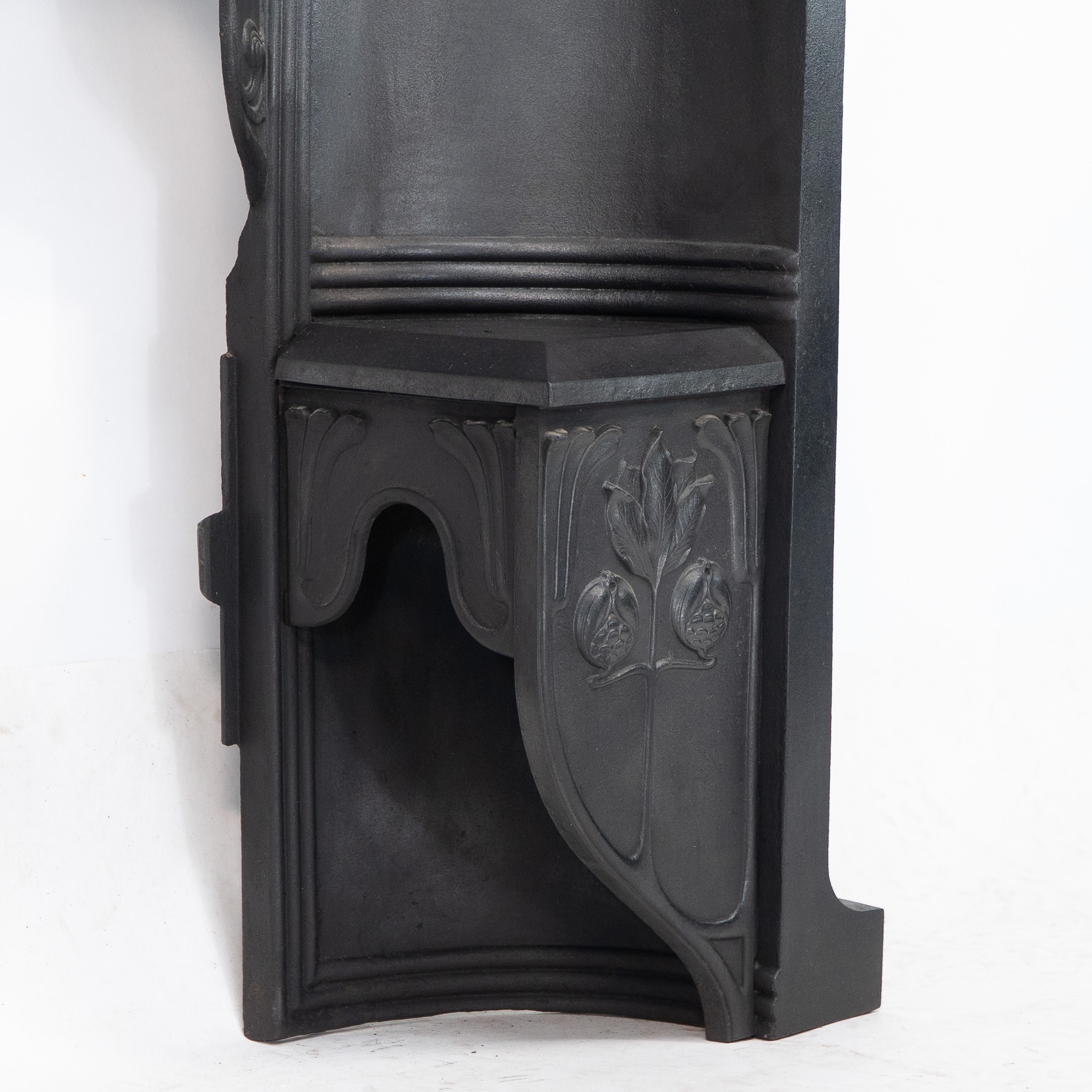 Arts & Crafts cast iron fireplace with curved sides & stylized floral decoration For Sale 6