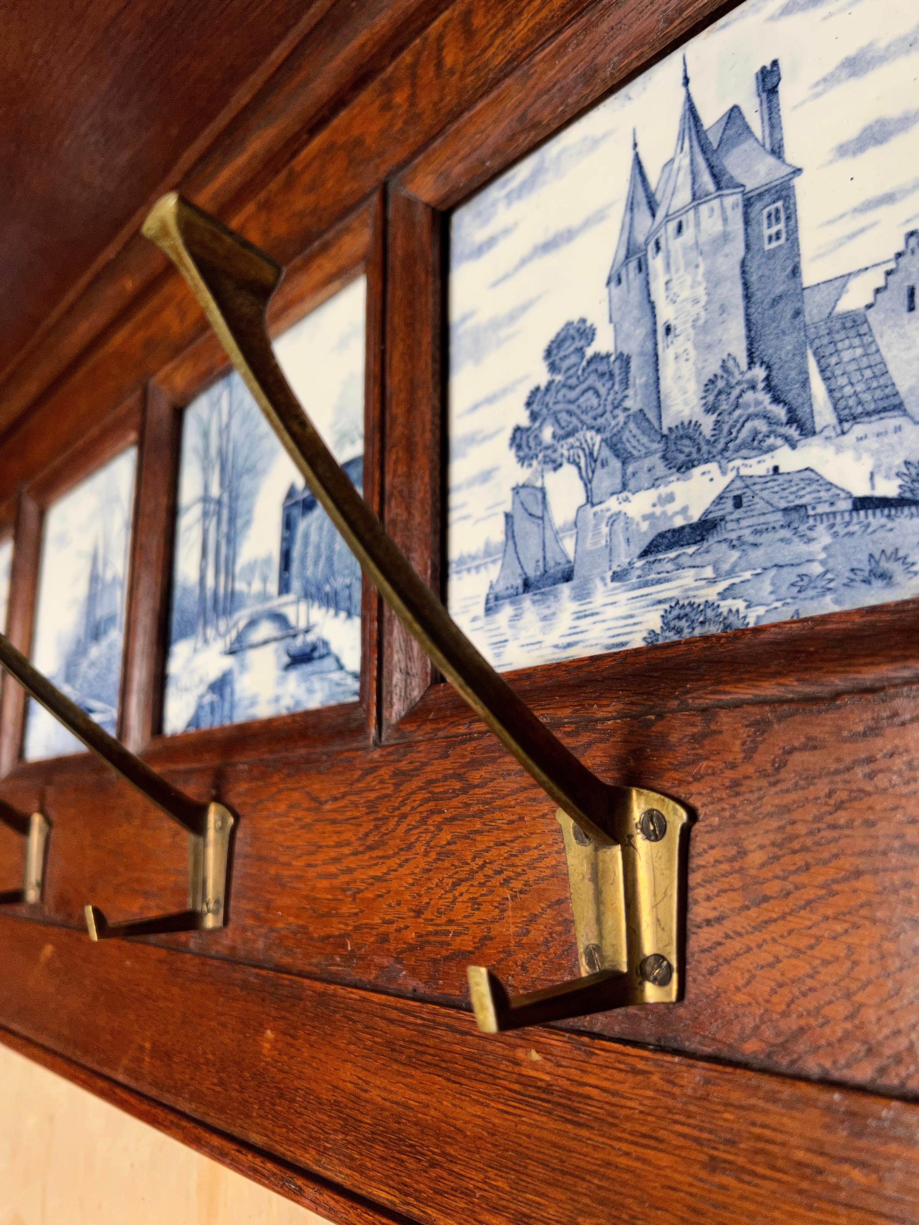 Hand-Carved Arts & Crafts Coat Rack with Stylish Delft Blue Glazed Tiles and Bronze Hooks