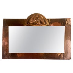 Miroir Arts & Crafts encadré de cuivre par Archibald Knox pour Liberty & Co