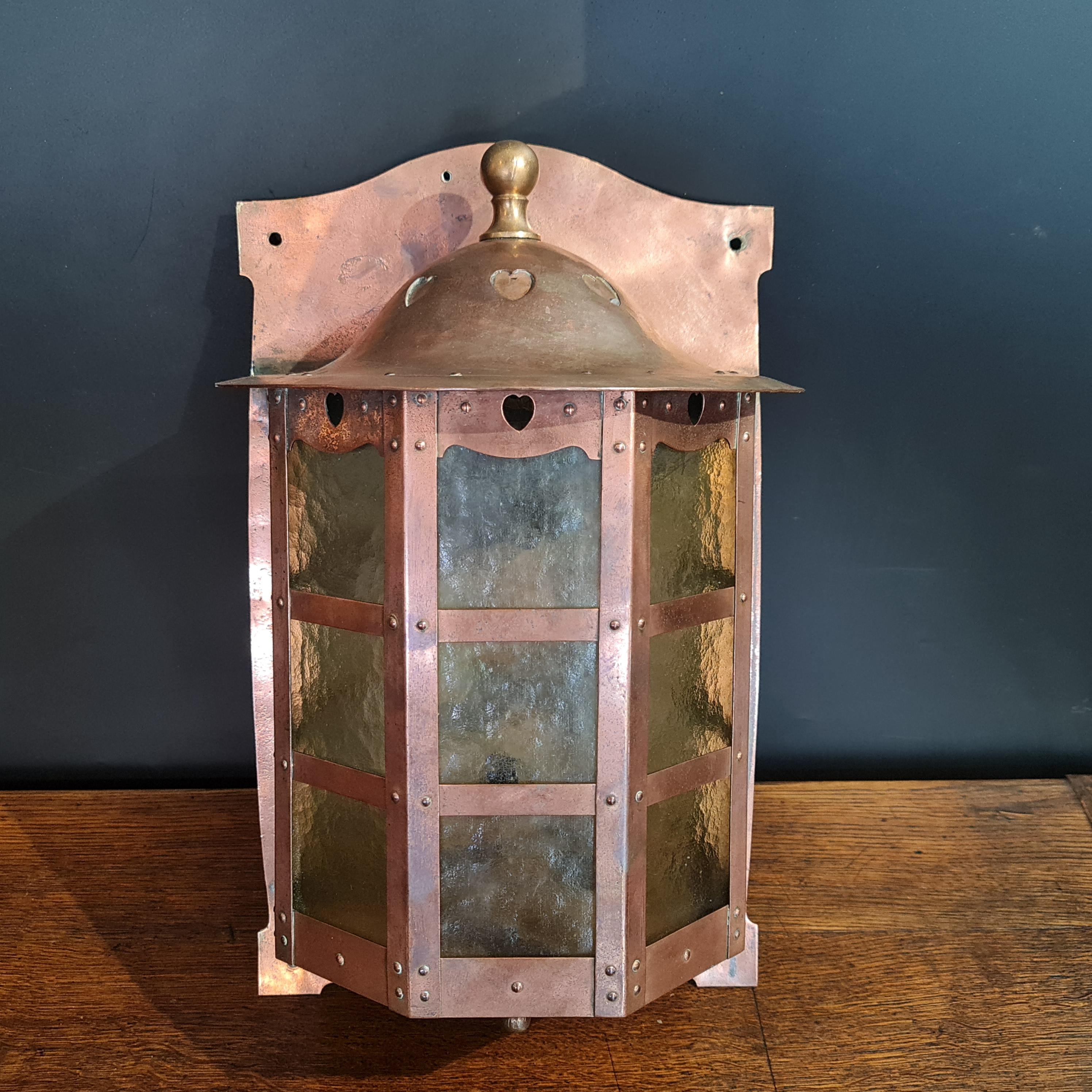 Rare original Arts & Crafts copper wall lantern by The Birmingham Guild of Handicrafts Ltd circa 1900. The light is currently un-wired but wiring to your rquired specification is included in the price. The glass is all in excellent condition.