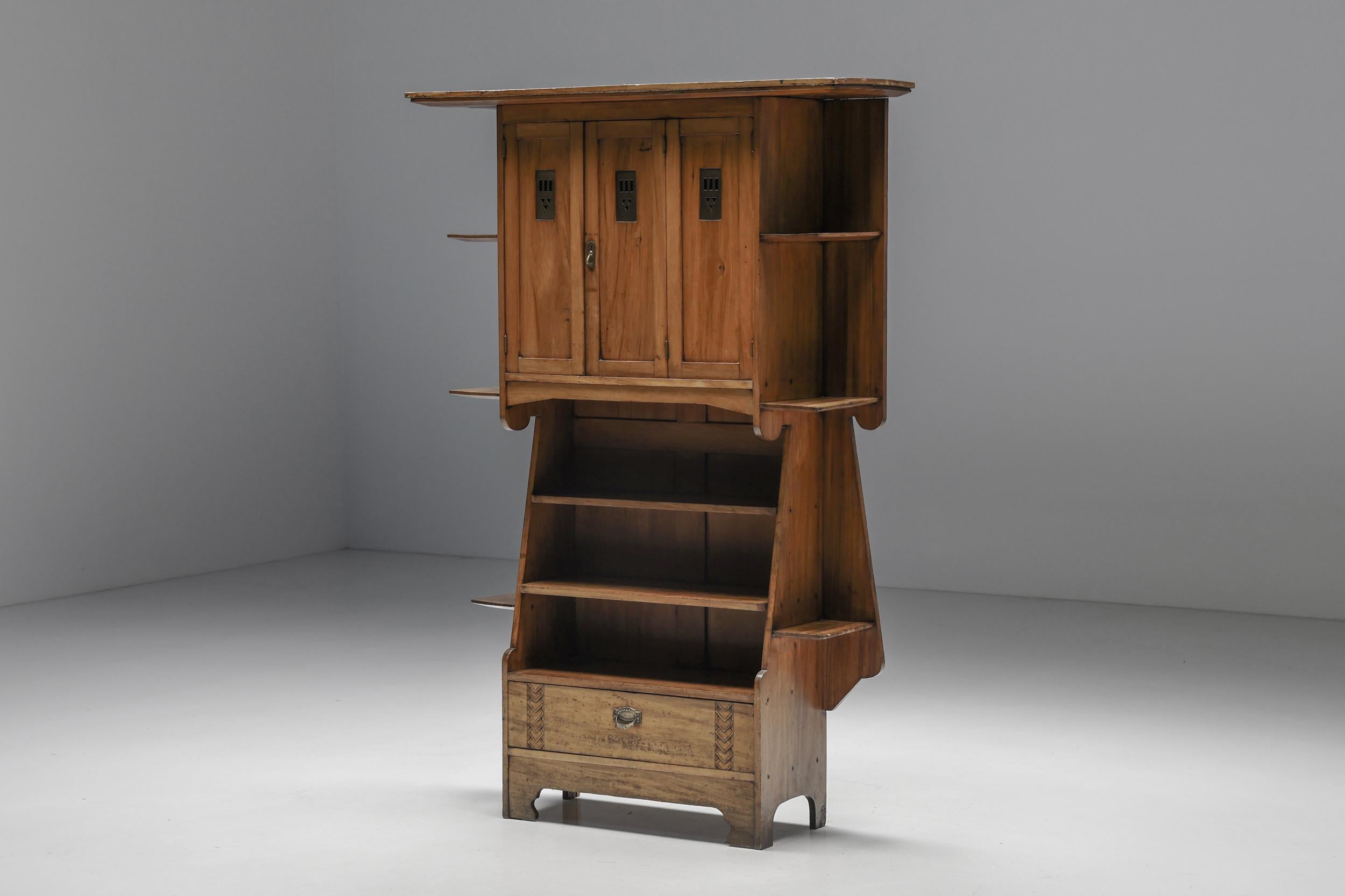 Arts & Crafts; Cupboard; Charles Rennie Mackintosh; 20th Century; Wood; Cabinet; Shelves; Mid-Century Modern; Scotland; Scottish Design; Craftsmanship; Architect; Modernism; Art Nouveau; 

This remarkably well-crafted wooden cupboard is created by