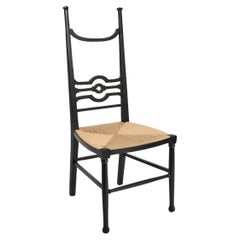 Arts & Crafts ebonised wood fireside chair, 1900s