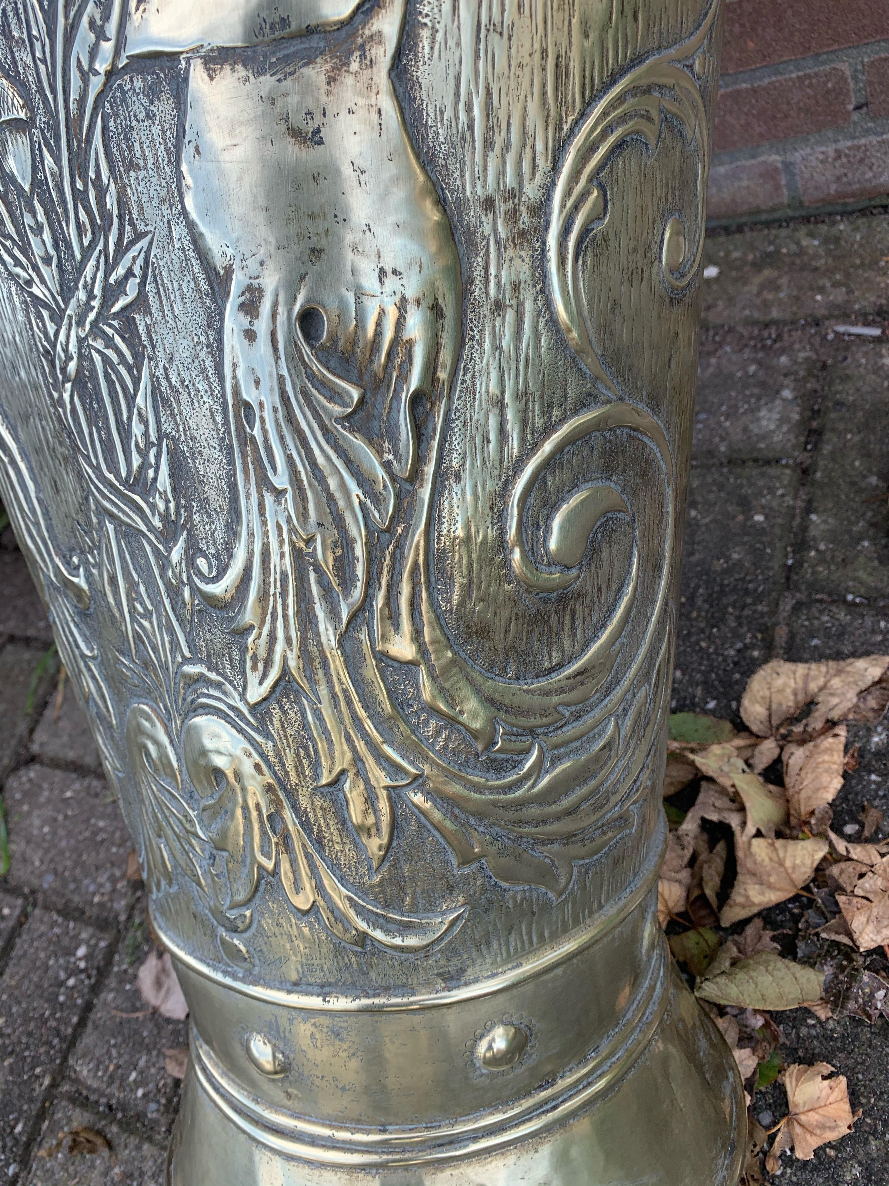 Arts & Crafts Era Embossed Brass with Angel Sculptures Umbrella and Stick Stand In Good Condition For Sale In Lisse, NL