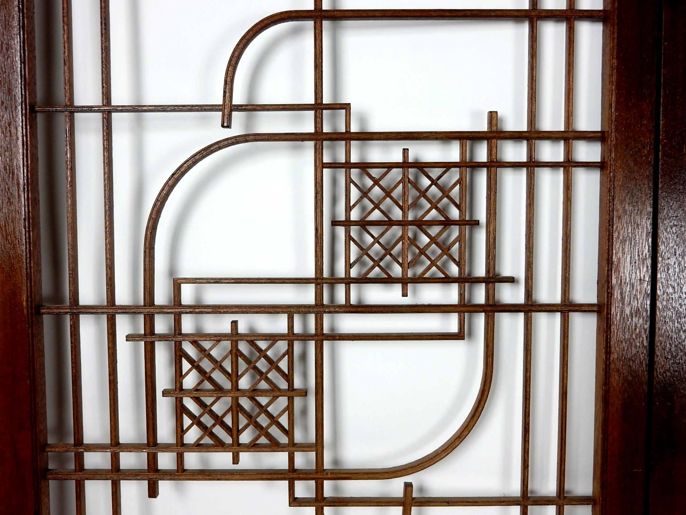 Attributed to Frank Lloyd Wright design this geometric wood window screen, circa 1930's. From a bungalow estate in the Broadmoor area of Colorado Springs, CO.
Hand crafted with fine detail. Panels are hinged together with a period metal hinge,
