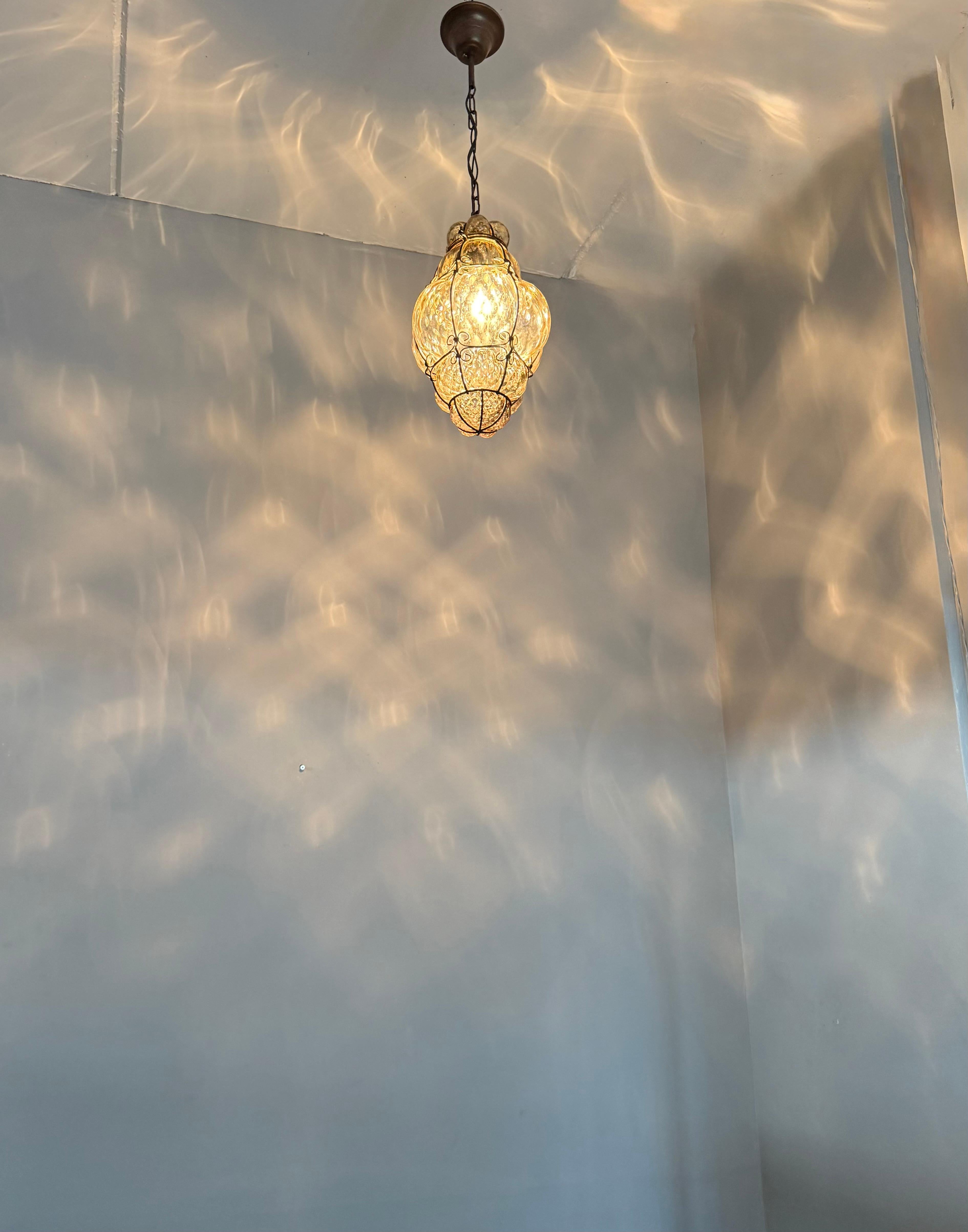 Arts & Crafts Era Venetian Pendant Light of Mouthblown Glass into an Iron Frame For Sale 2