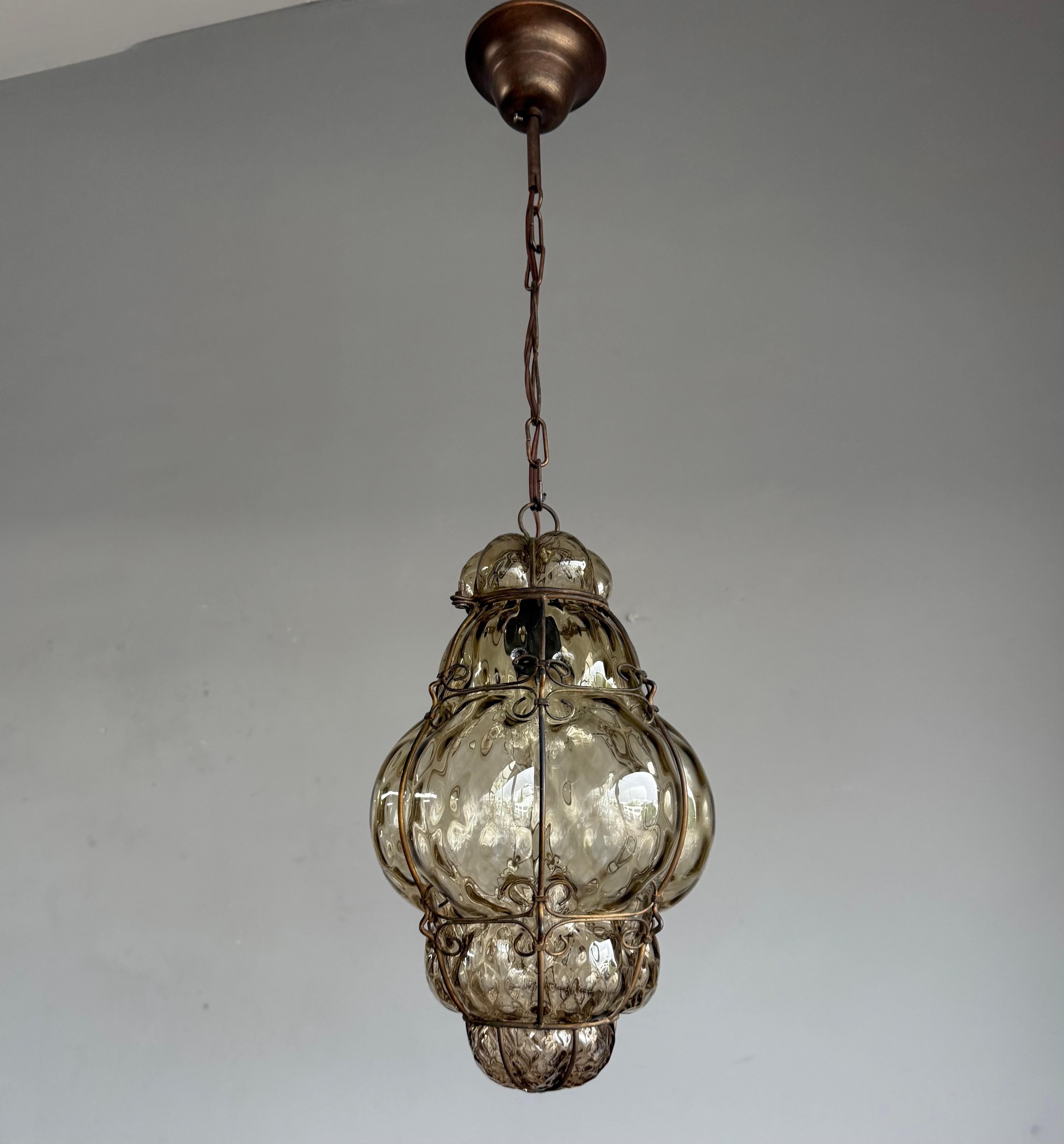 Arts & Crafts Era Venetian Pendant Light of Mouthblown Glass into an Iron Frame In Good Condition For Sale In Lisse, NL