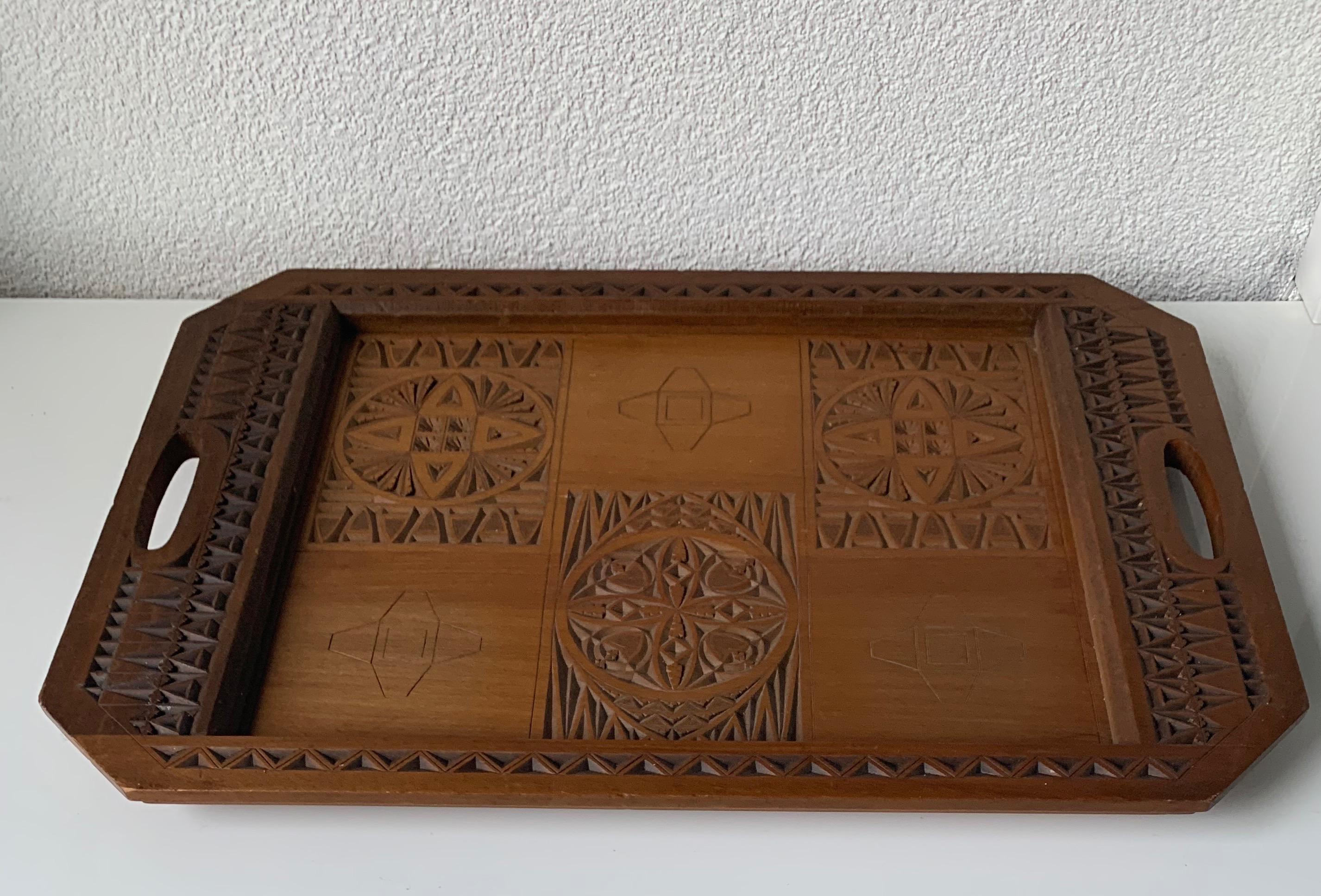 Unique Arts & Crafts serving tray in mint condition.

This museum quality and condition serving tray is another one of our recent great finds. The look and feel of this beautifully designed and finely executed serving tray is second to none and it