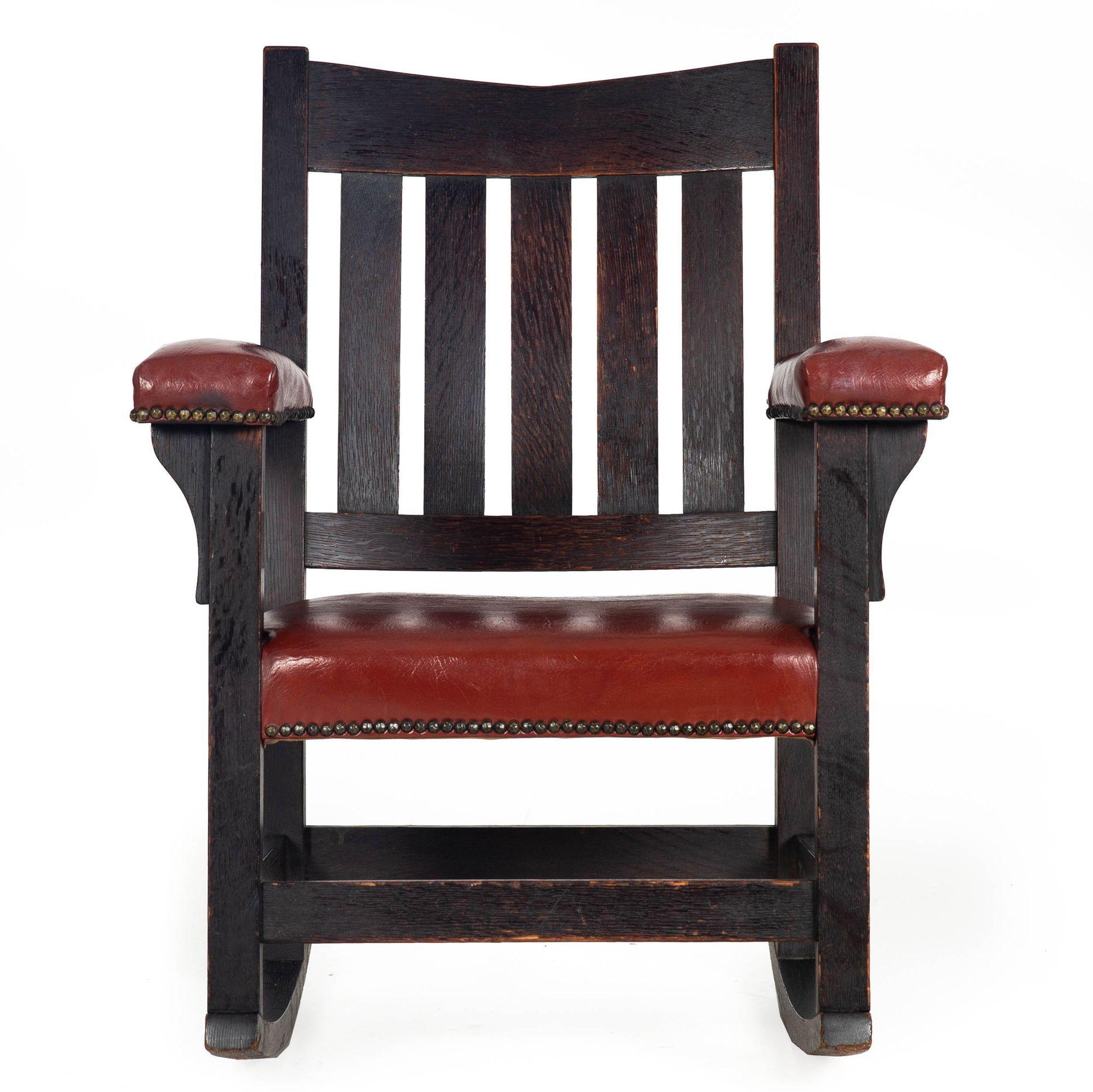 MISSION EBONIZED OAK ROCKING CHAIR NO. 311 1/2
Gustave Stickley ca. 1904-7, red ink maker's mark to the reverse
Item # 309VAX24P
Described in their 1904 catalogue as being 