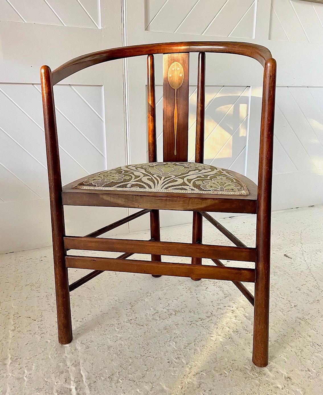 Glasgow School steamed ash and beech armchair

With stylised peacock inlay decoration

Mahogany back splat inlaid with mother of pearl and boxwood

Tapering flared legs and double stretcher

Upholstered in Art Nouveau fabric

Circa 1900

Height