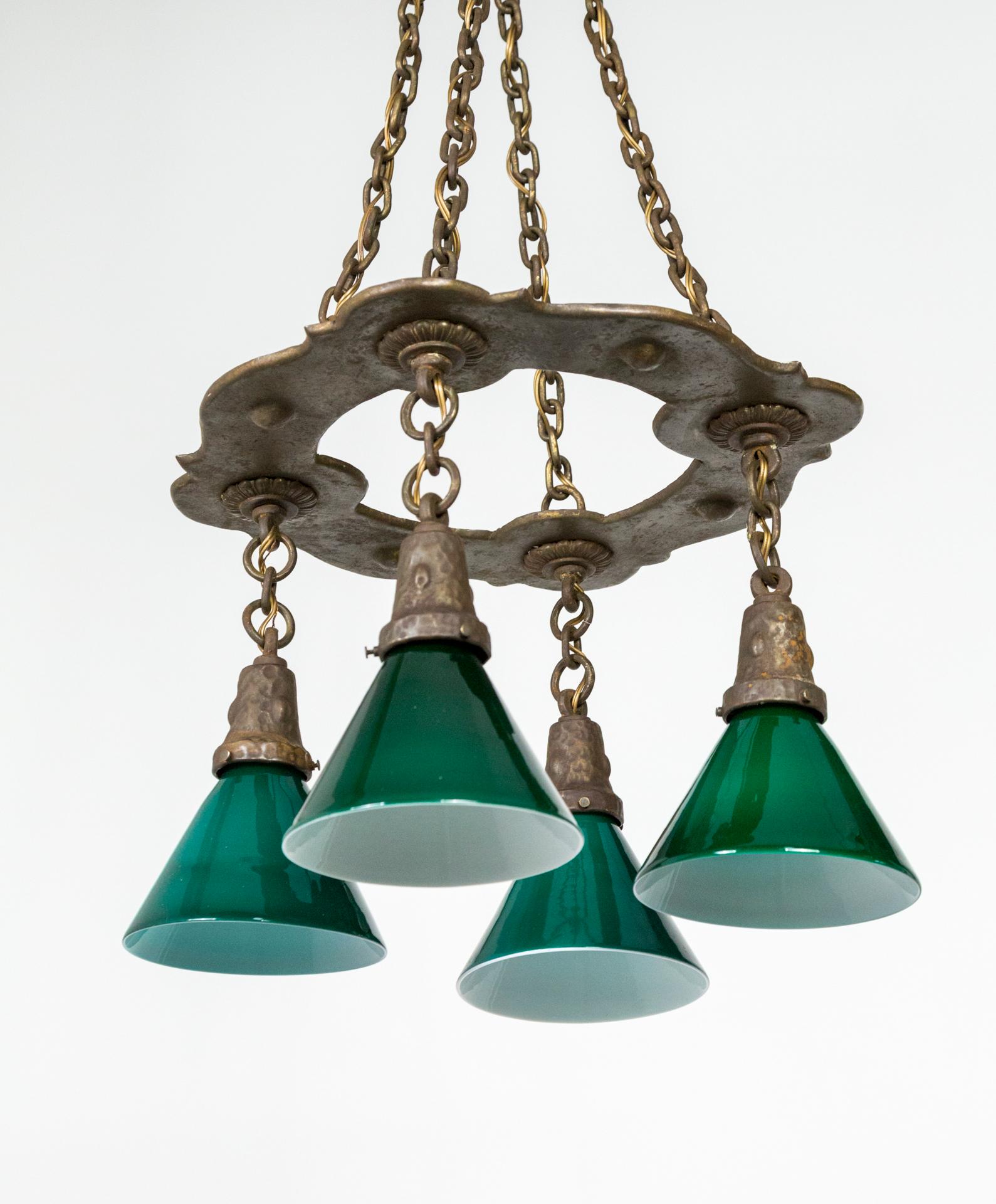 Arts & Crafts Hammered Darkened Metal Chandelier with Green Glass Shades In Good Condition For Sale In San Francisco, CA