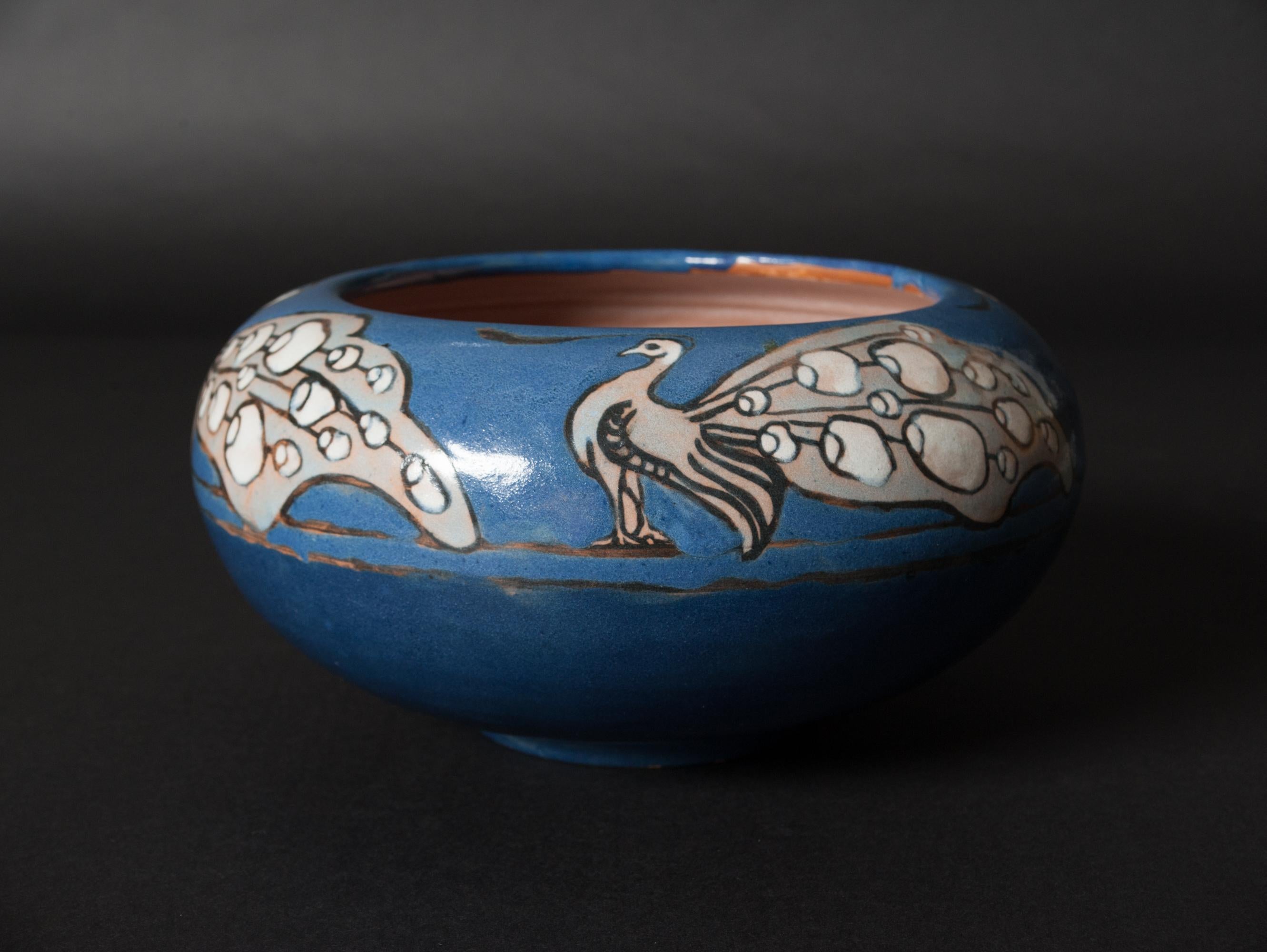 Hand-thrown Peacock Bowl by Frederick Rhead. Decorated in cureta seca. Potter at wheel stamp incised 