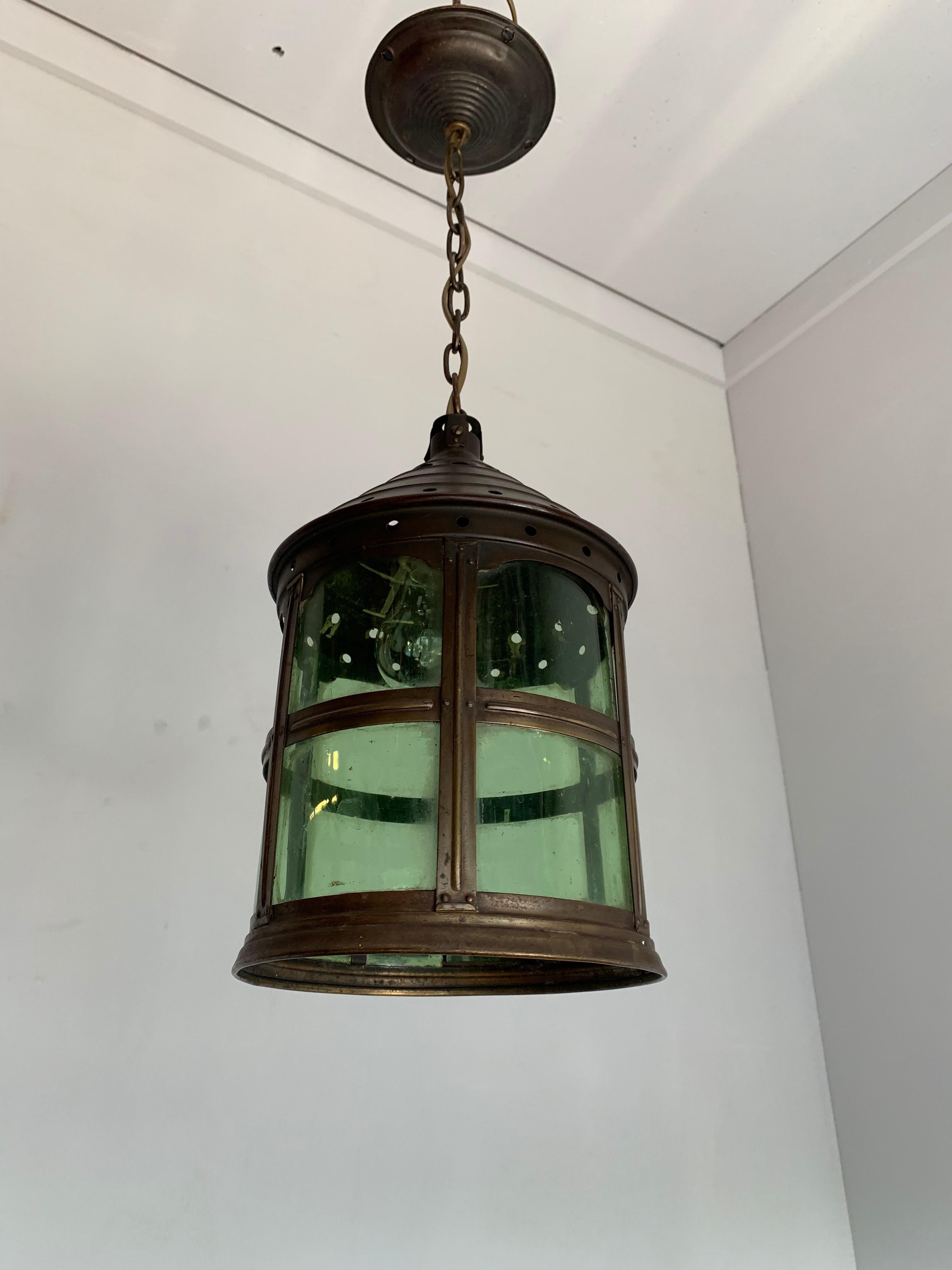 Unique and all handcrafted, round light fixture.

If you are looking for a stylish and quality crafted lantern to grace your entry hall, landing or bedroom then this Arts & Crafts beauty could be perfect for you. This early twentieth century light