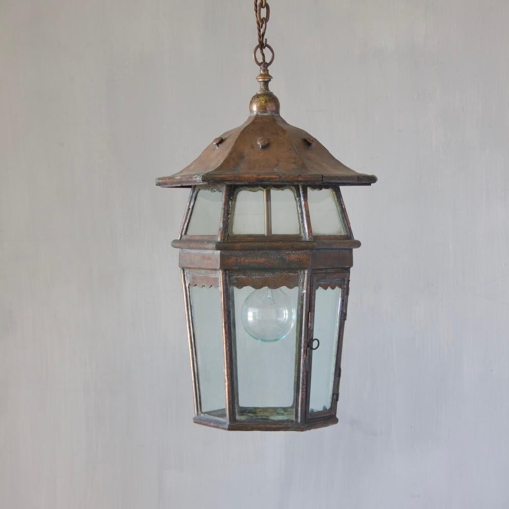 A rare, early 20th century Arts & Crafts copper lantern with unusual two-tier design, England, circa 1900.