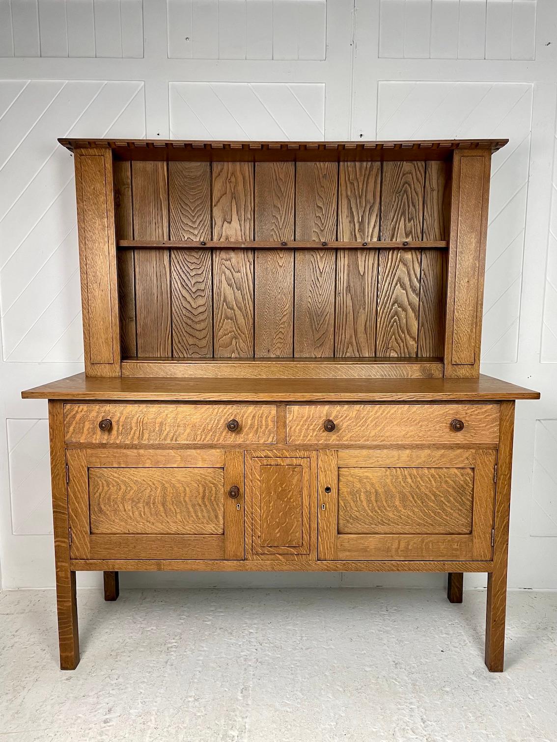 Arts & crafts quarter sawn oak dresser
with turned knob handles
Chestnut tongue and groove back boards
‘Letchworth’ range
Heals
Circa 1905
Designed by Sir Amrbose Heal and displayed at Letchworth as part of the Cottage Furniture Range, first