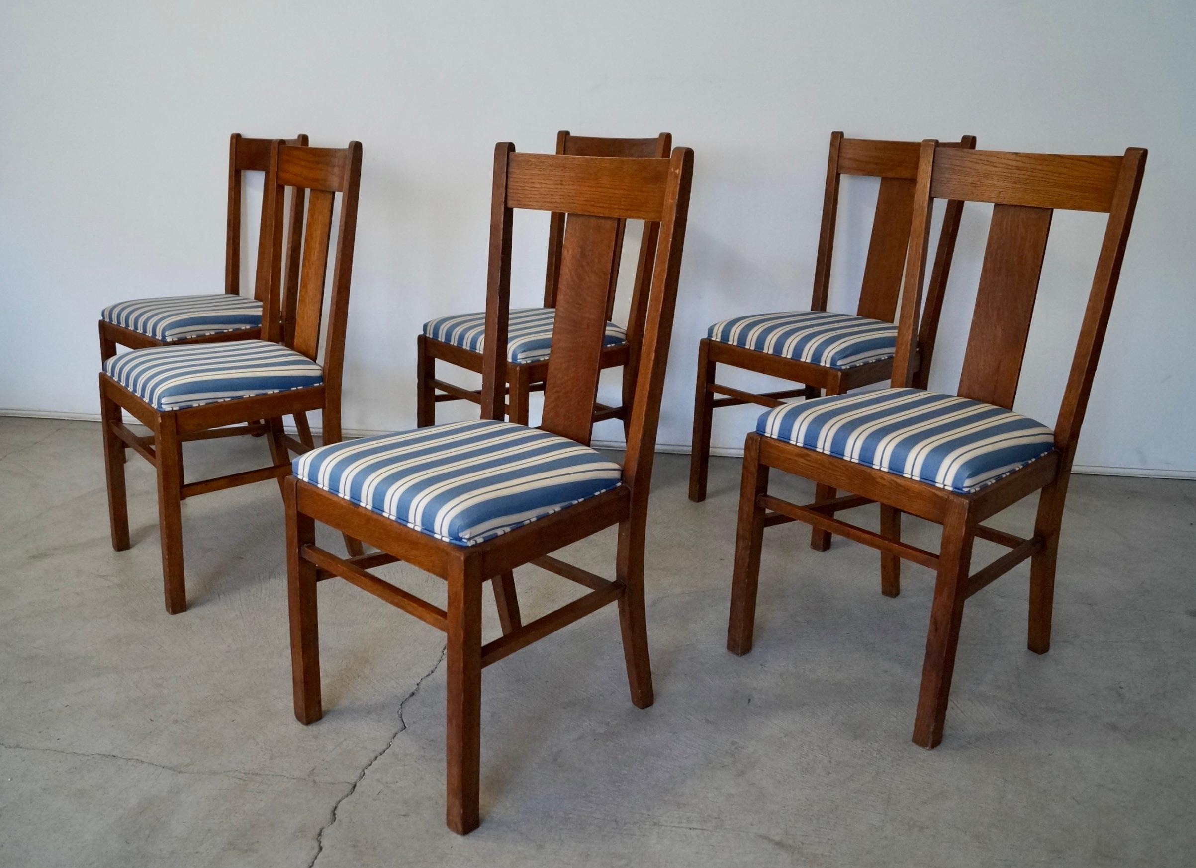 Antique original Mission Spanish dining chairs for sale. These are a set of six, and were manufactured by Heywood Brothers and Wakefield Company in the early 1900's. They still have the original label. Heywood Brothers went on to become Heywood