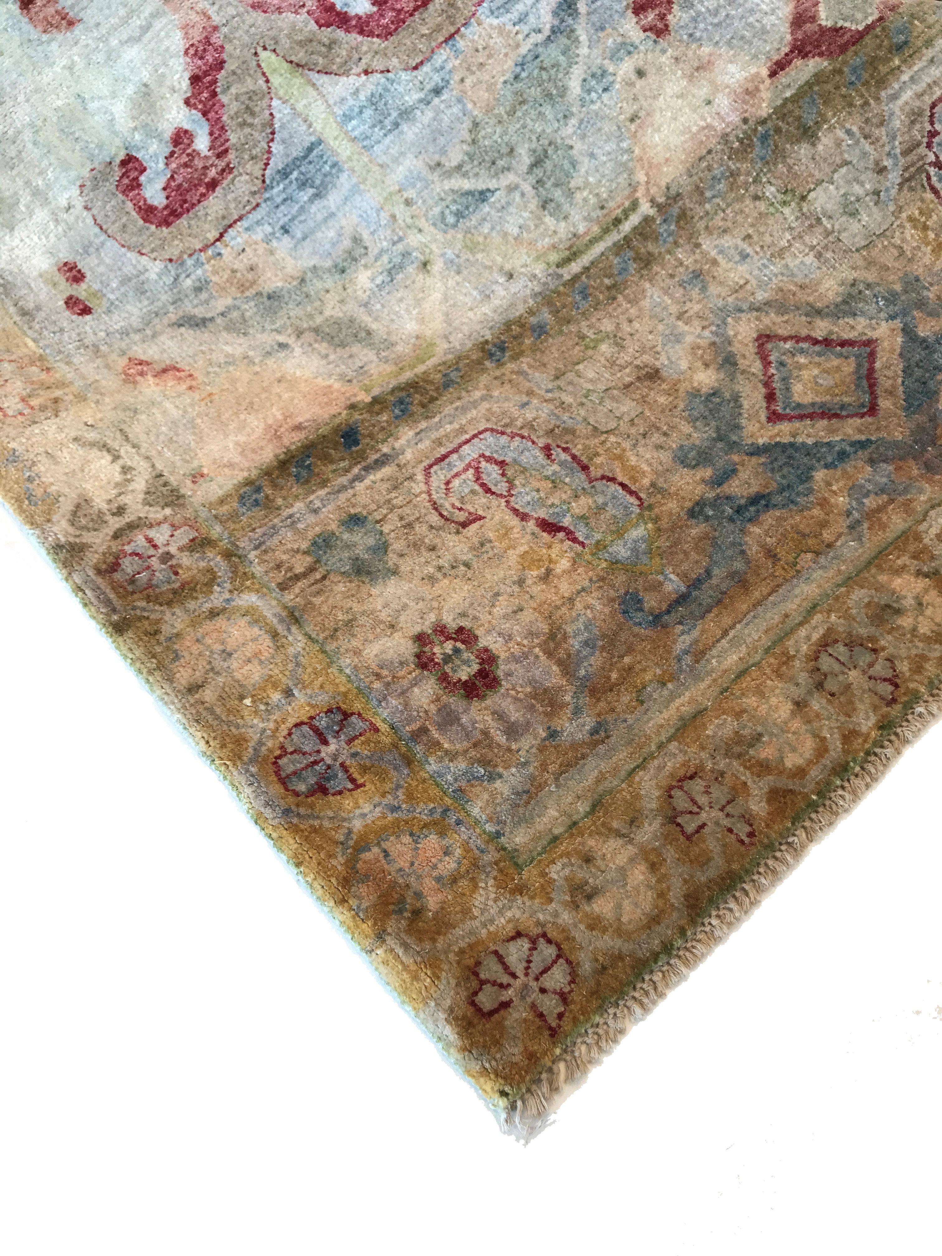 This one-of-a-kind washed silk carpet adds both visual and textural softness and a quiet luxury to any space in your home. The delicate motif inspired by the Arts & Crafts movement sees organic and floral designs enlarged and abstracted for
