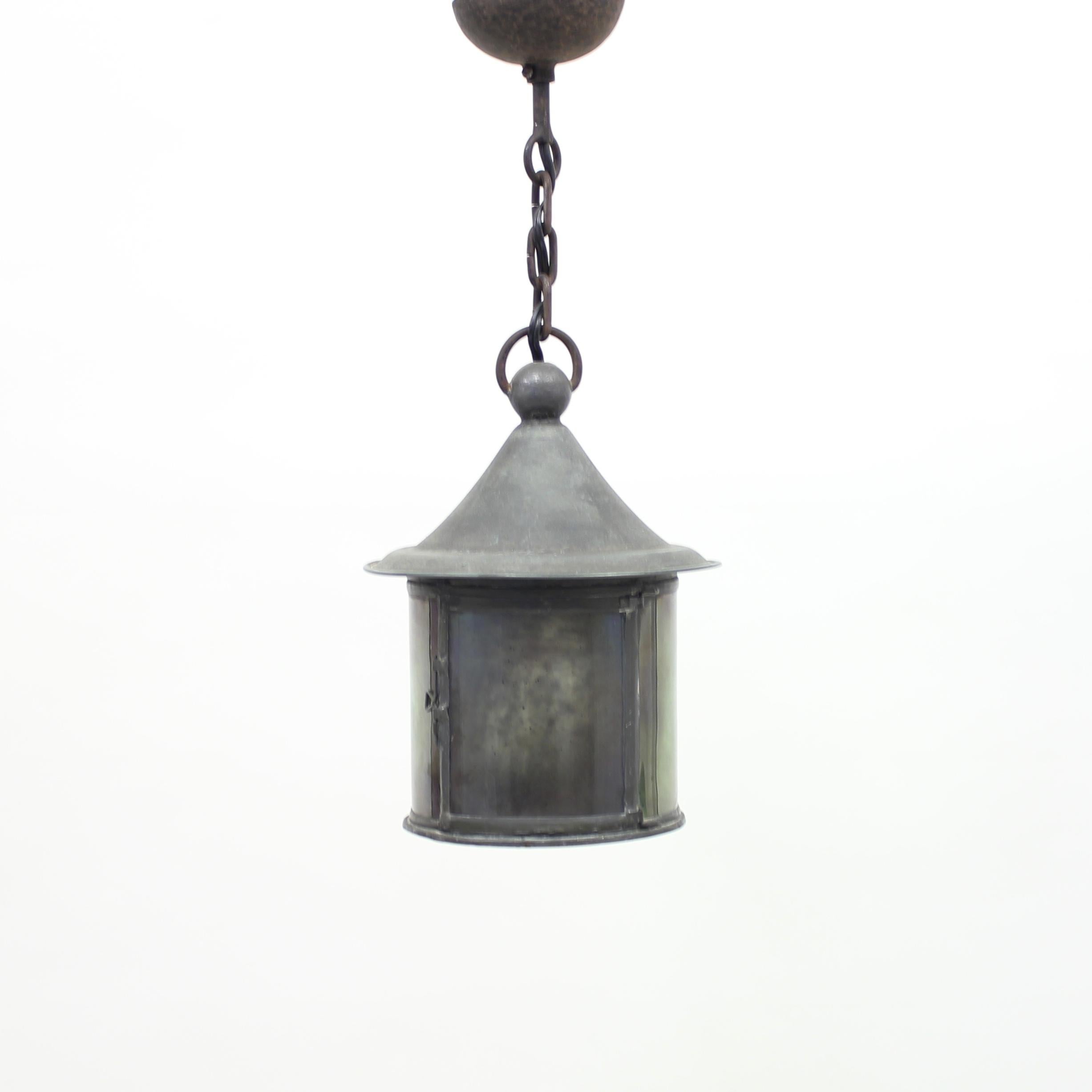 Arts & Crafts electrified lantern in glass and iron, early 20th century. This lantern was originally in use at Uppsala Slott (The castle of Uppsala) in Sweden. The castle is still a landmark in Uppsala which is the forth biggest city in Swedens. The