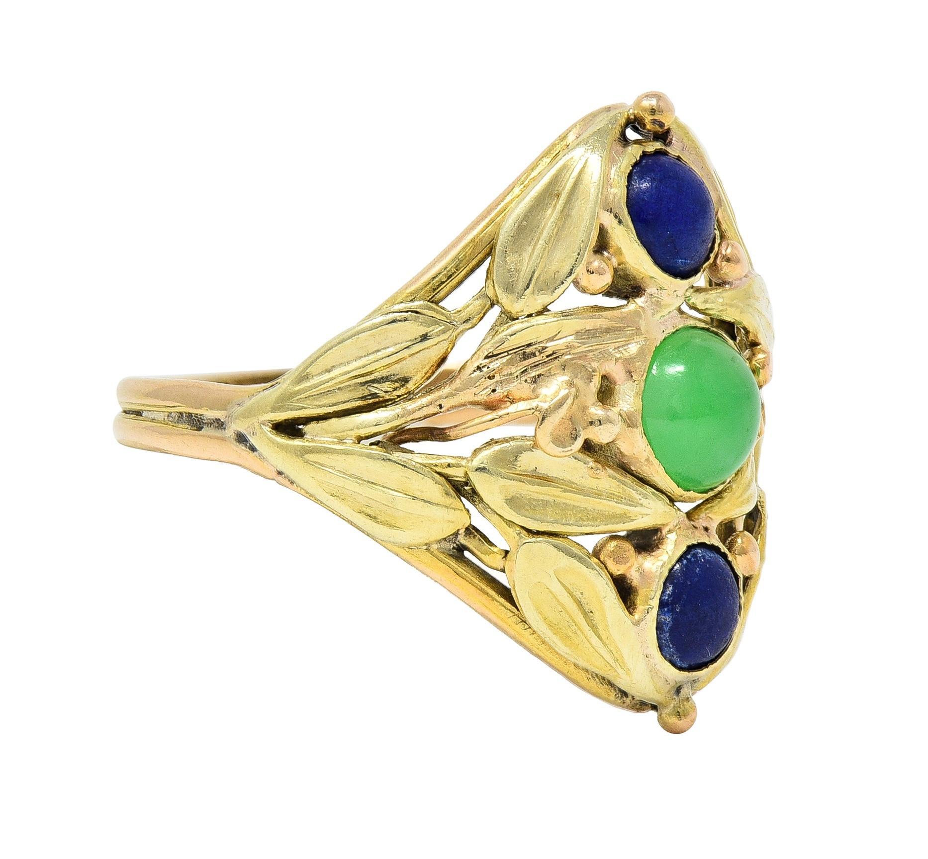 Designed as a rose gold navette shape comprised of yellow gold clustered foliage
Centering a row of jade and lapis lazuli round cabochons 
Jade measures 4.5 mm round - translucent, vibrant green
Lapis lazuli measures 3.5 mm round - opaque
