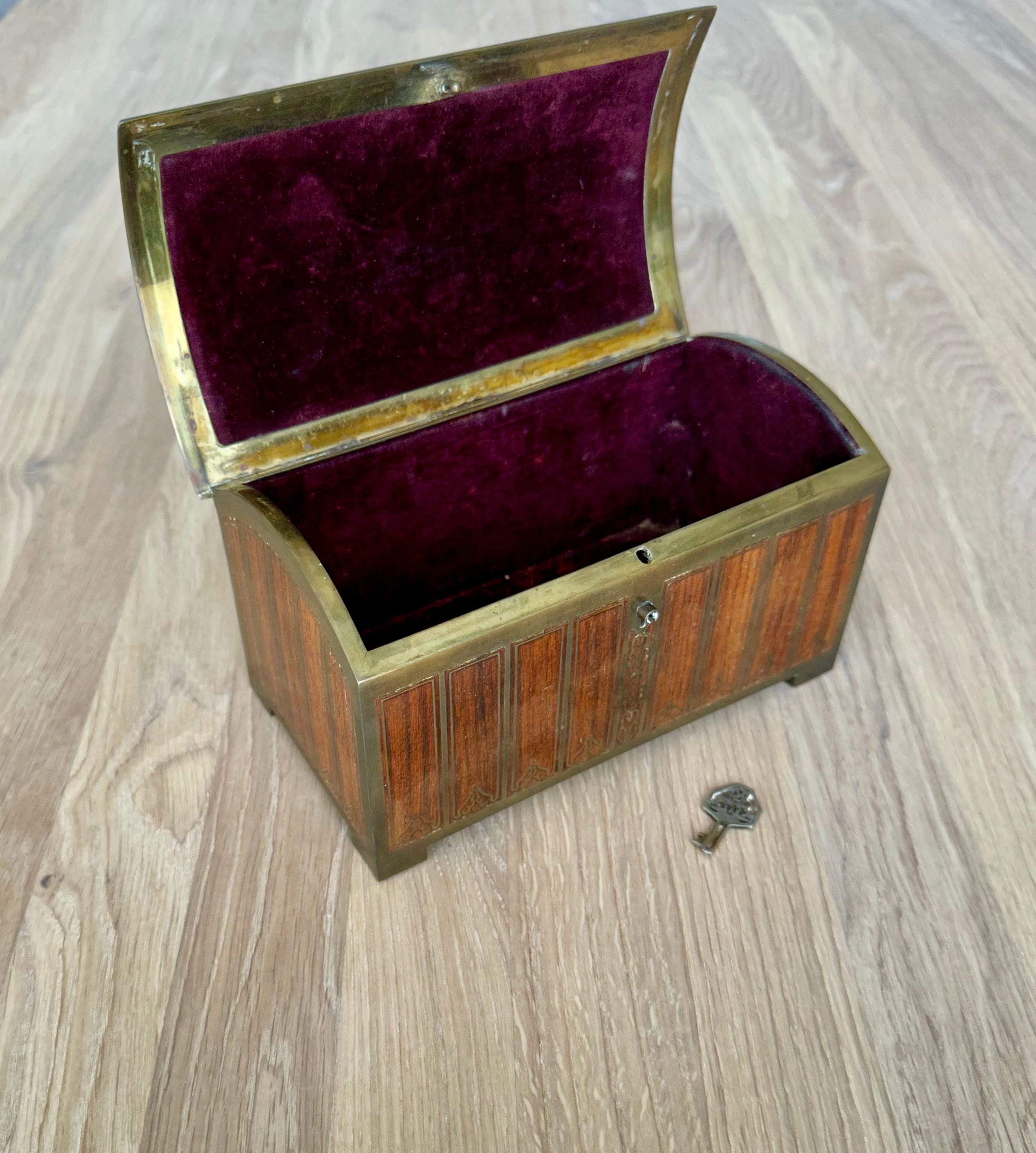 Stunning and great condition, brass Secessionist box with amazing inlay and the original key.

There are -for good reasons- collectors of the Viennese Secession Style in almost every country on this globe. The finesse of the workmanship, the