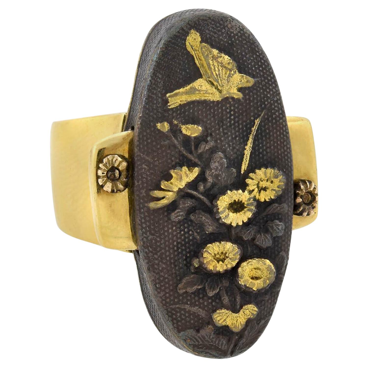 Arts & Crafts Large Shakudo Plaque Ring with Flower and Butterfly Motif