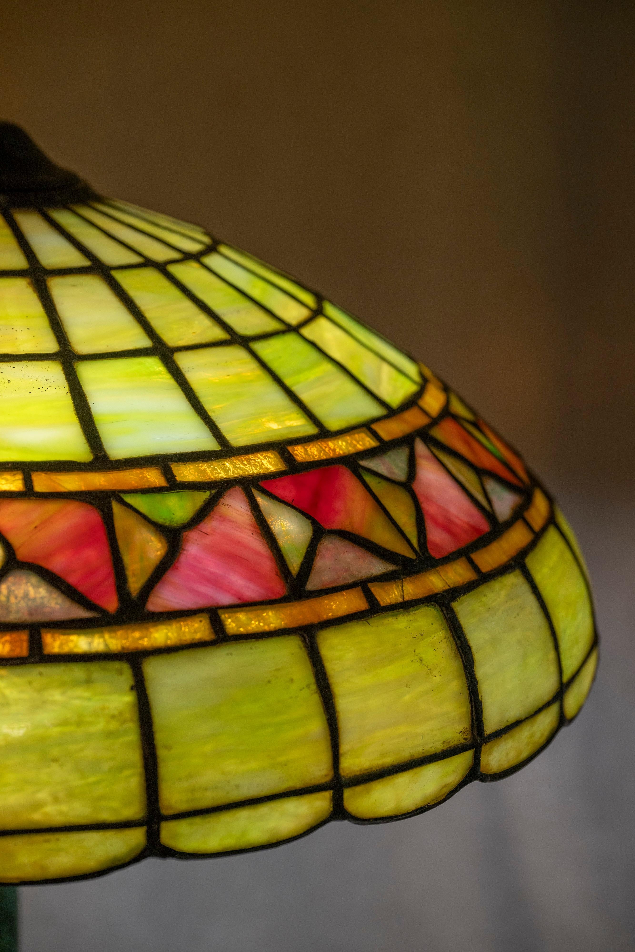 This American leaded glass table has a clean look and would well in any setting, especially in an Arts & Crafts home. The shade is guaranteed to be made by the Duffner & Kimberly Co. ca.1910. They were Tiffany's chief competitor in these lamps.