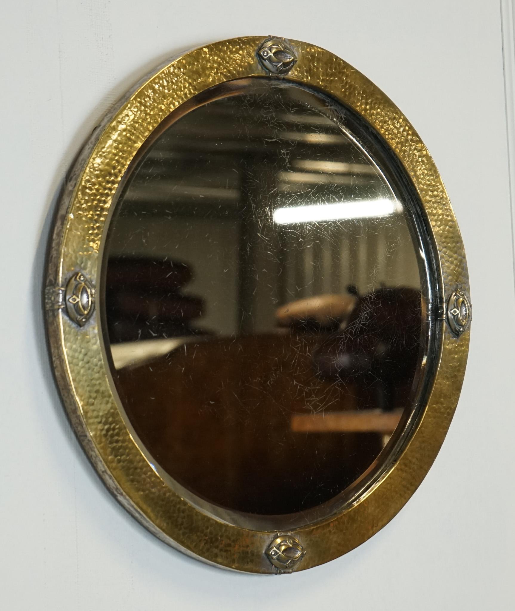 British ARTS & CRAFTS LIBERTYS OF LONDON HAMMERED BRASS WALL MIRROR CiRCA 1910 For Sale