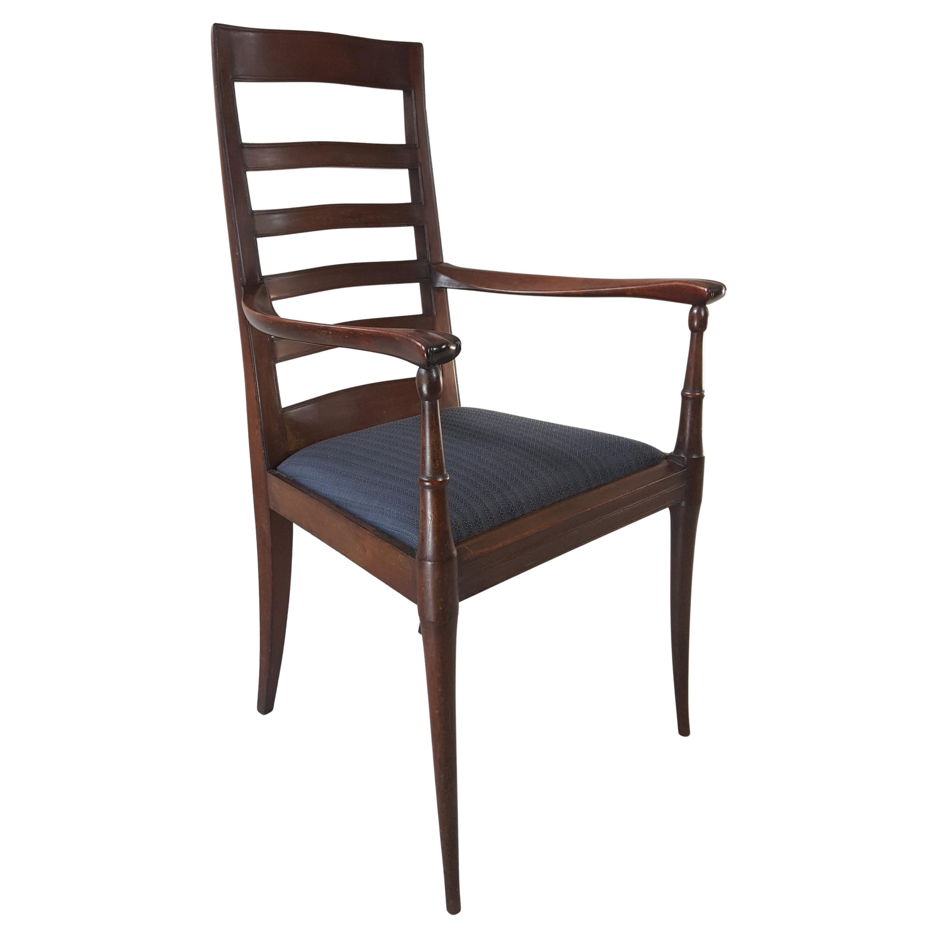 Unique fine quality Arts & Crafts  mahogany armchair re-upholstered in dark blue horse hair. This chair on first appearnce is in the style of Glasgow architect George Walton but is in fact by furniture designer Percy Wells. Most of Well's furniture