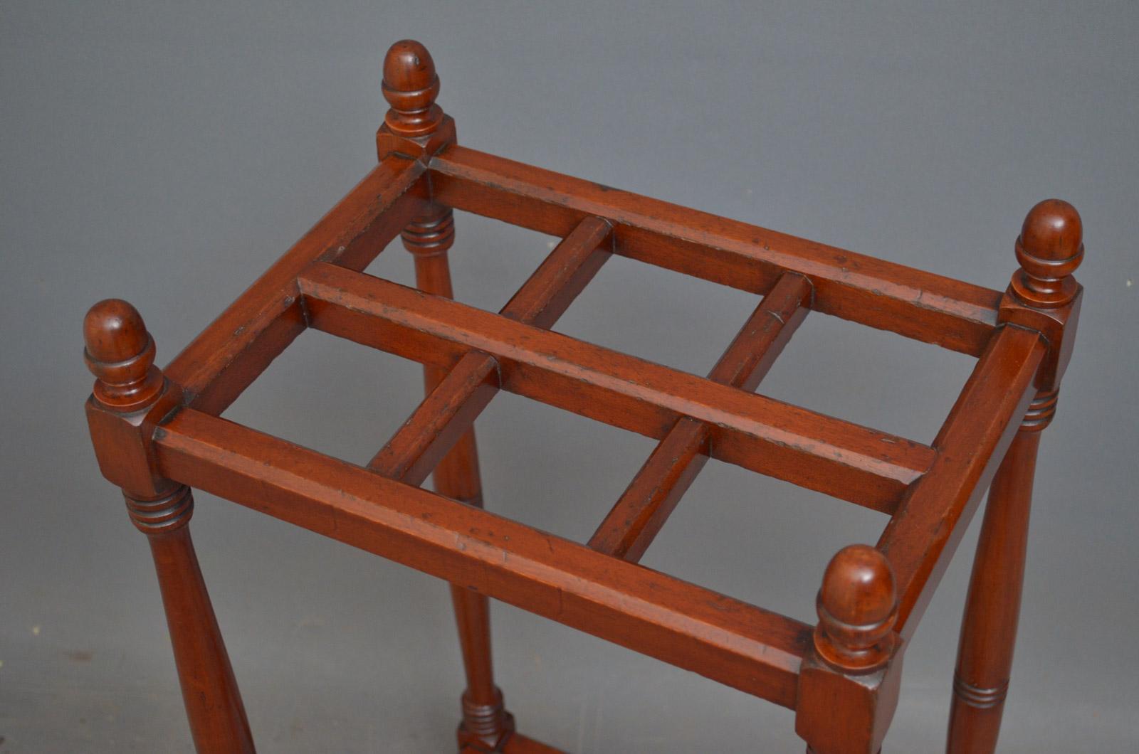 Sn4521 turn of the century mahogany stick stand / umbrella stand with 6 compartment, acorn finials and turned and ringed supports and original removable drip tray, all in home ready condition, circa 1900
Measures: H 28