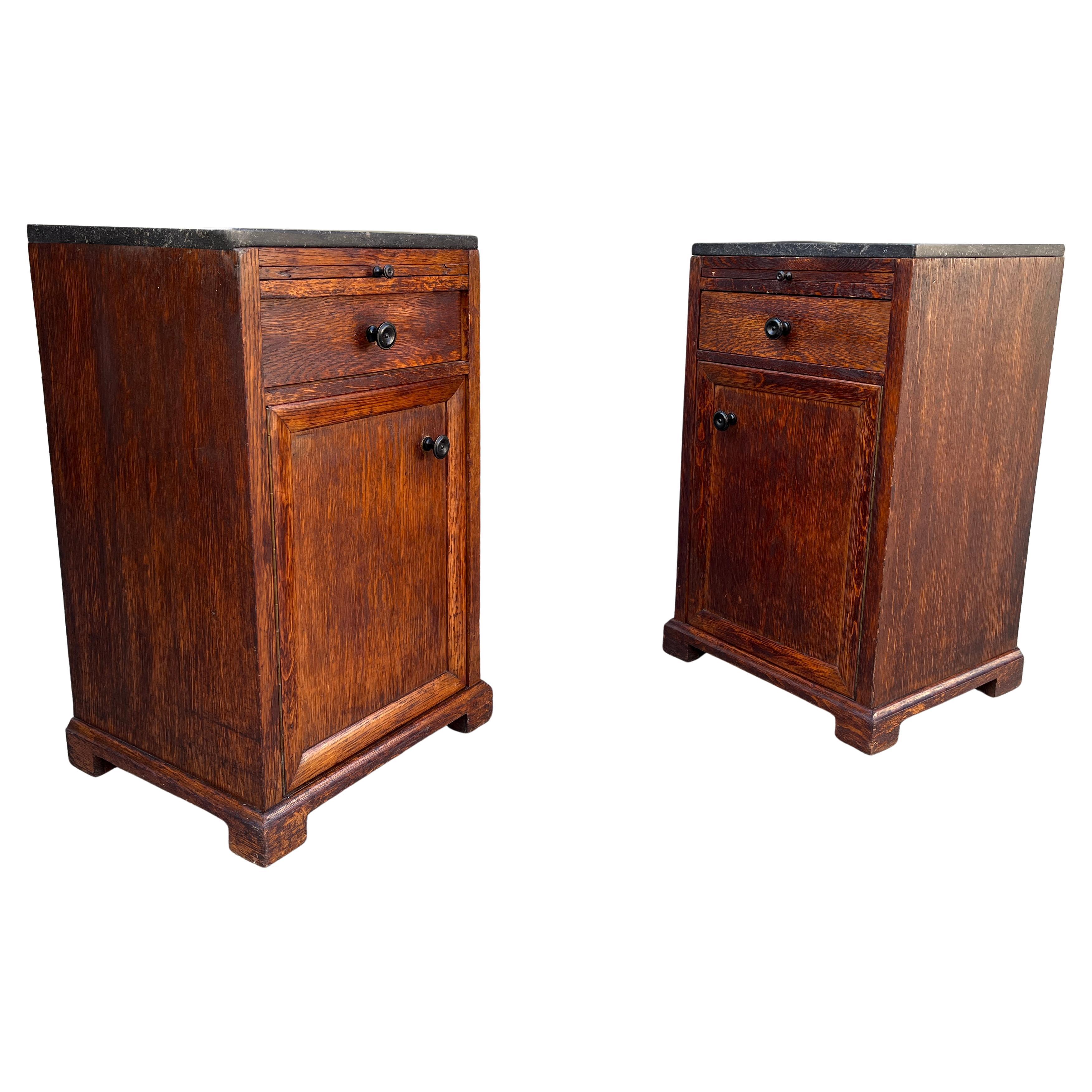Beautiful simple night stands made of oak. Featuring a pull out surface, a pull-out drawer, and bottom cabinet with granite top. Very well made with exceptional joinery and dovetailed construction. Perfect proportions. Blends well with Midcentury