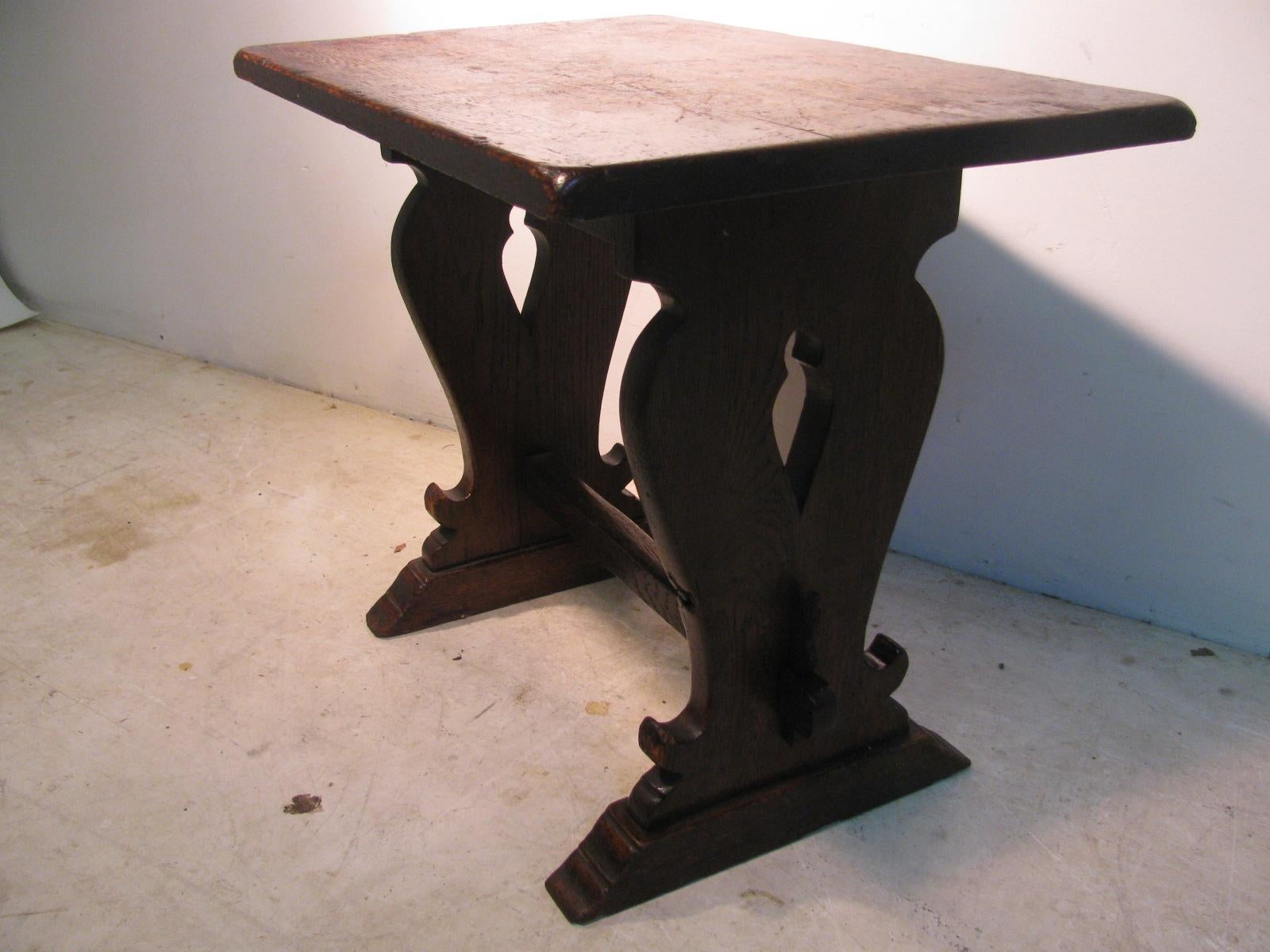 Fabulous and versatile side table or little bench. Period Arts & Crafts handmade during the Mission period. Mortise and tenon construction with keyed sides. Great style with spade cutouts. Perfect for the cabin or as a side table by the fireplace.