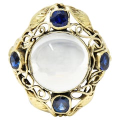 Antique Arts & Crafts Moonstone 1.00 Carat Sapphire 14 Karat Green Gold Floral Ring