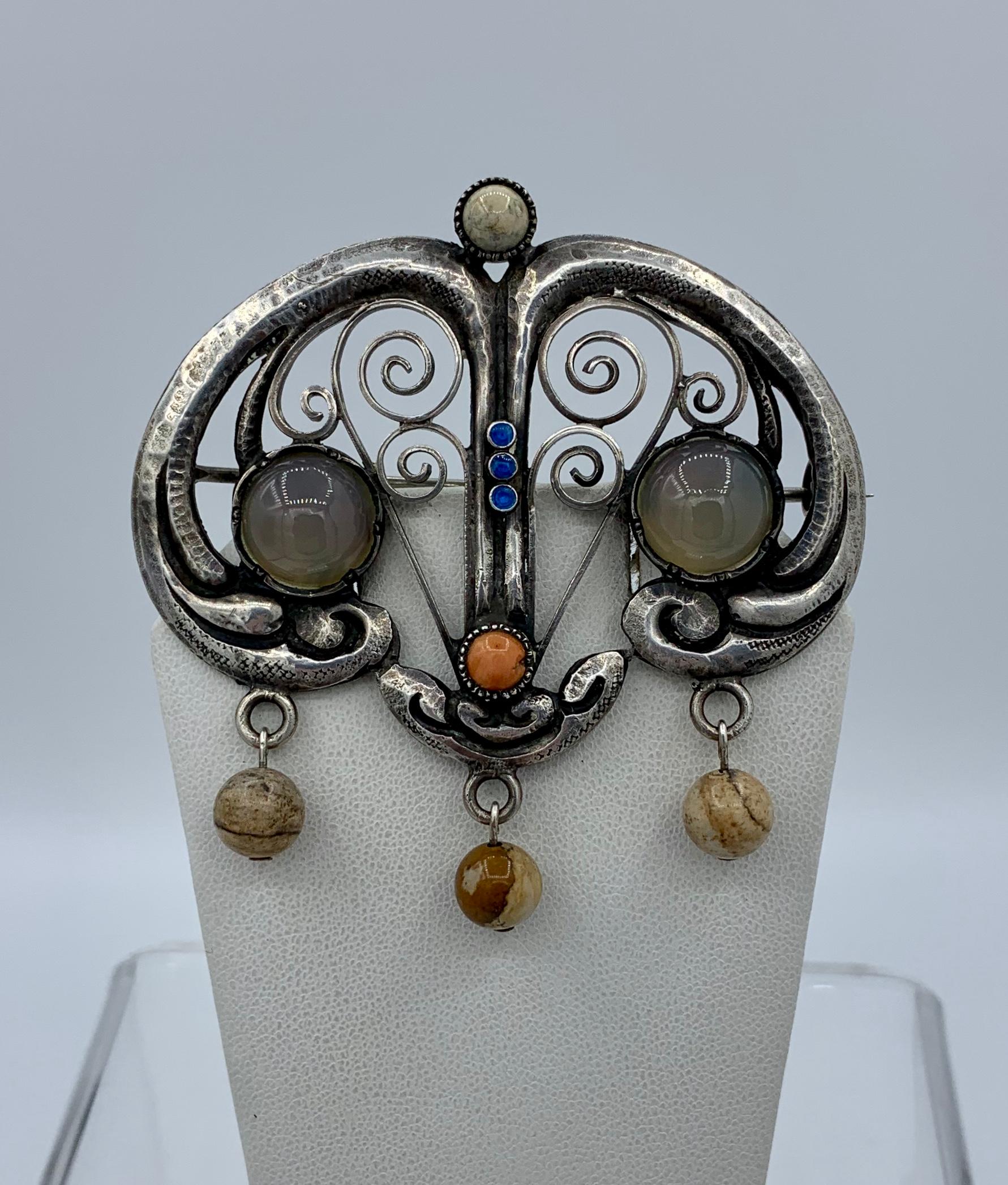 This is a magnificent Museum Quality Arts & Crafts Jugendstil Brooch from the estate of legendary philanthropist and collector Jacqueline Loewe Fowler, whose jewels are in the collection of the Metropolitan Museum of Art.   The brooch is of