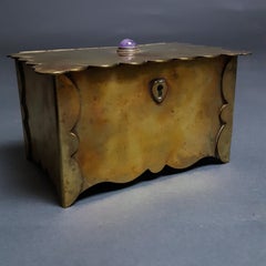 Arts & Crafts Movement brass box with amethyst cabochon