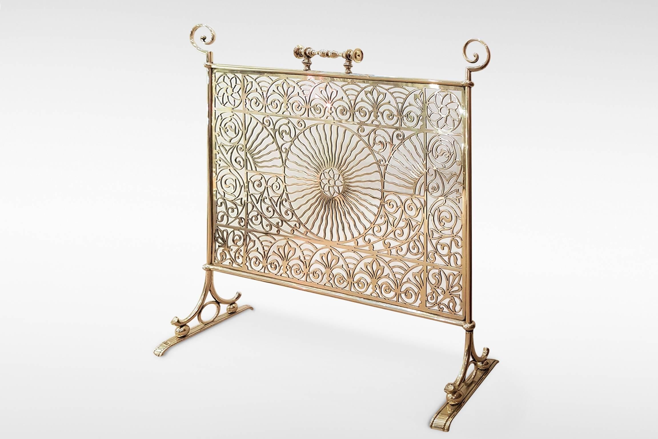 The influence of the oriental-inspired Aesthetic Movement is delightfully evident in this charming pierced brass firescreen from the Arts & Crafts period.

circa 1880s.