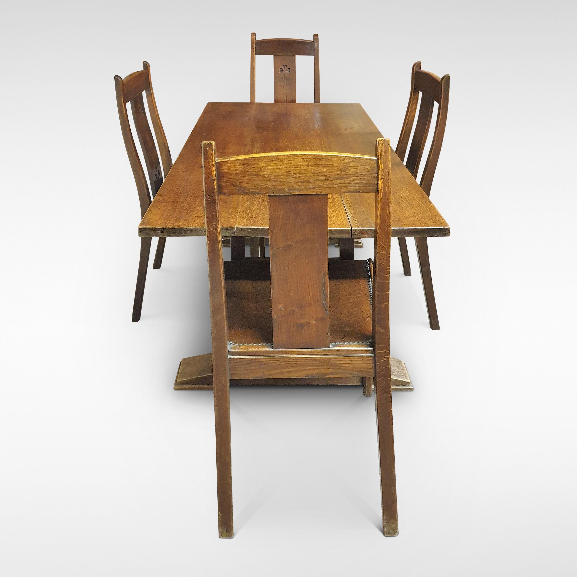 Arts & Crafts dining table together with chairs by Arthur Simpson of Kendal. Table of pegged construction, four dining chairs with carved decoration to splats, circa 1905

A fine quality set attributed to a highly regarded figure in the Arts &