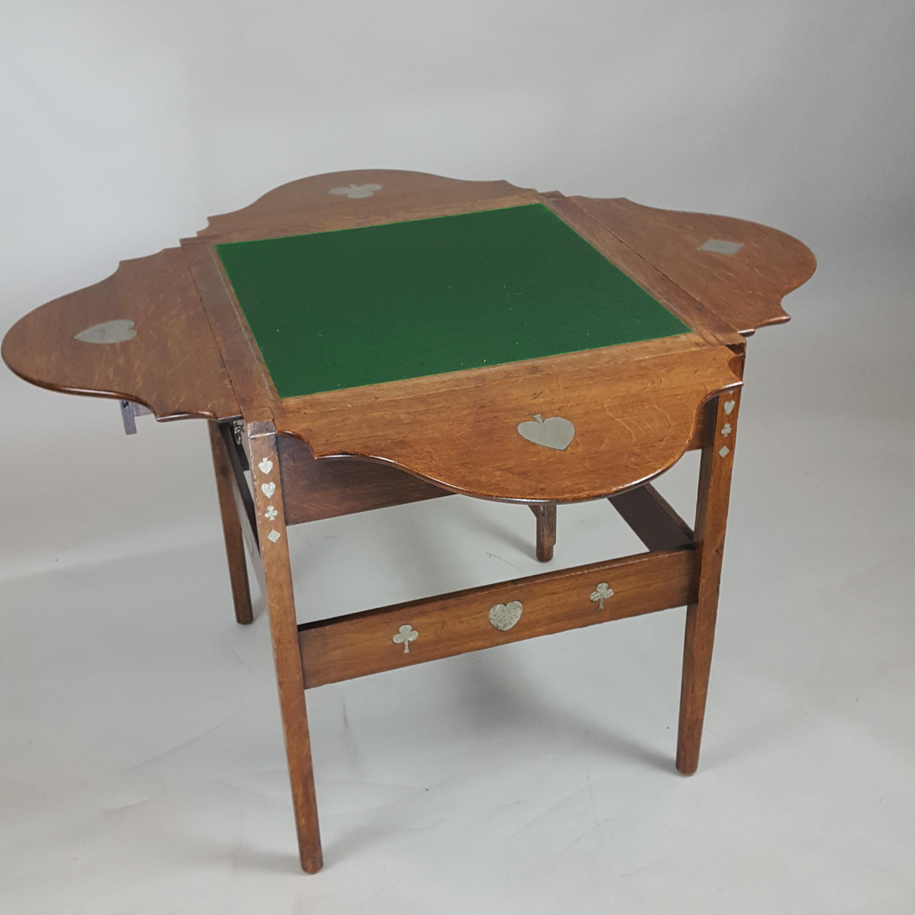 British Arts & Crafts oak and pewter inlaid card table  C. F. A. Voysey For Sale
