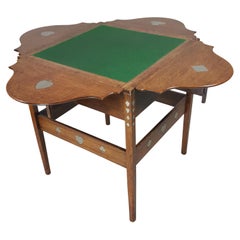 Arts & Crafts oak and pewter inlaid card table  C. F. A. Voysey