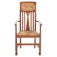 Arts & Crafts Oak and Rush Armchair