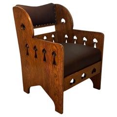 Arts
Crafts Oak Armchair With Pierced Decoration