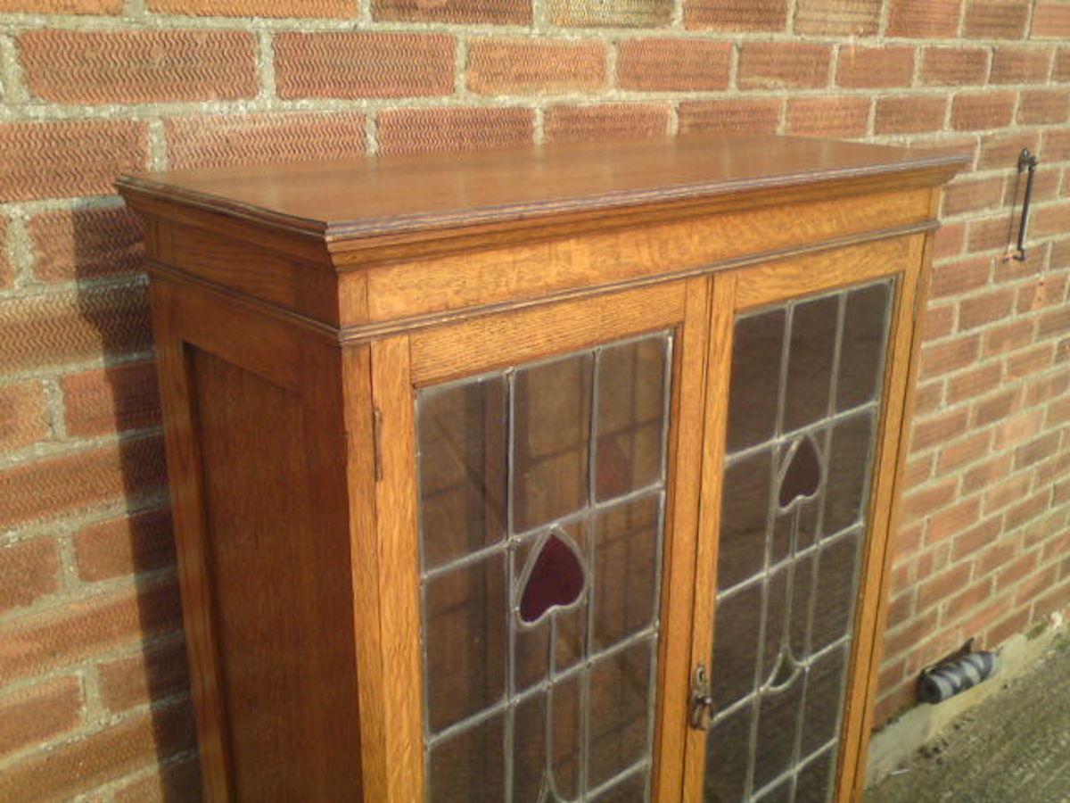Hand-Crafted Arts & Crafts Oak Bookcase with Stylized Floral Stain Glass and a Cupboard below