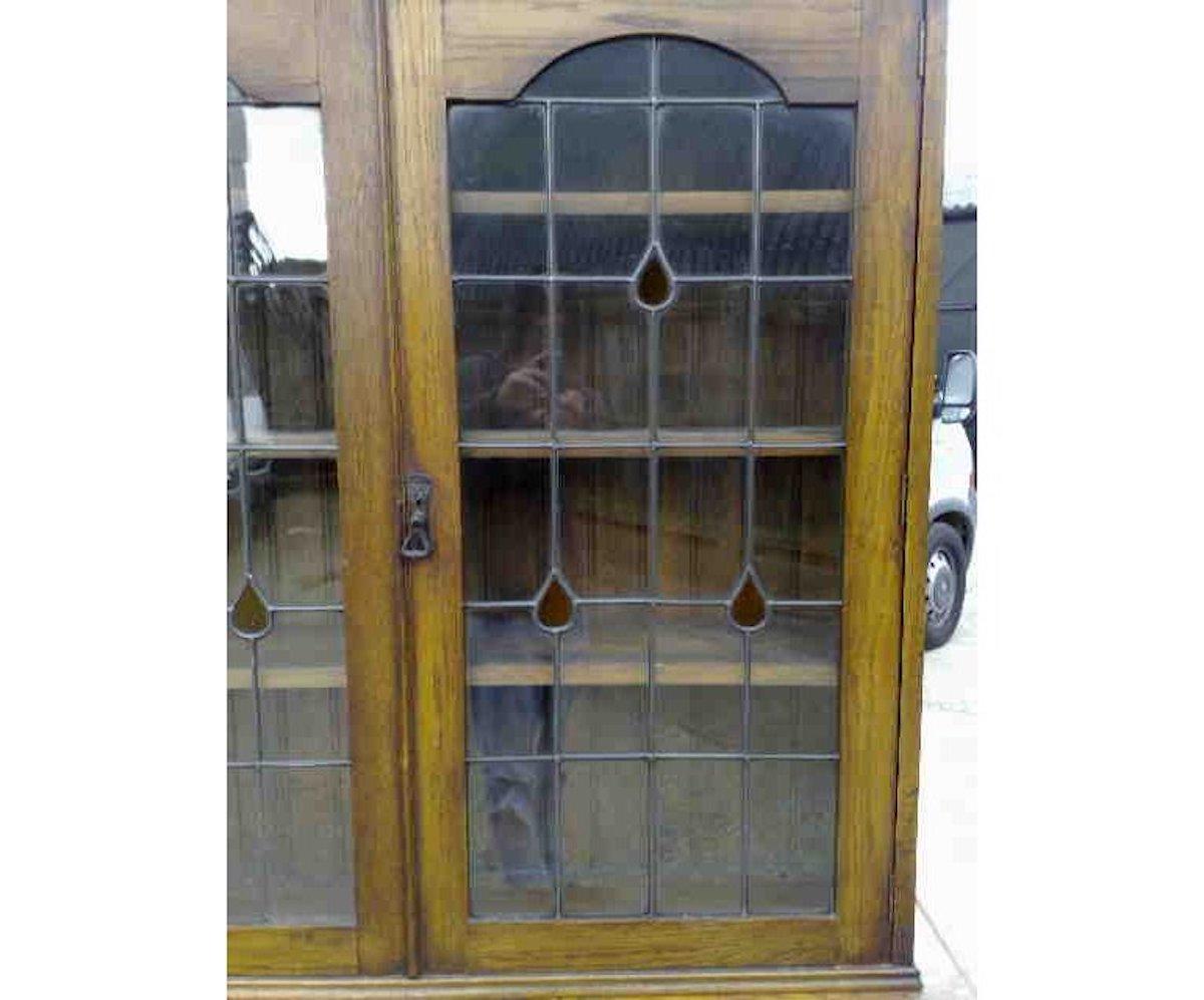 English Arts & Crafts Oak Bookcase with Teardrop Stain Glass, Drawers and Lower Cupboard For Sale