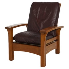 Chaise Morris Arts & Crafts en chêne Gustav Stickley avec accoudoirs à nœud et pieds coniques à l'envers