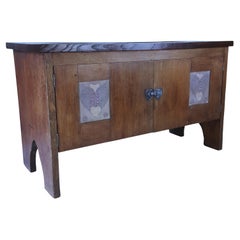 Arts & Crafts oak low cupboard or coffer with gesso panels  attr. Henry T. Wyse