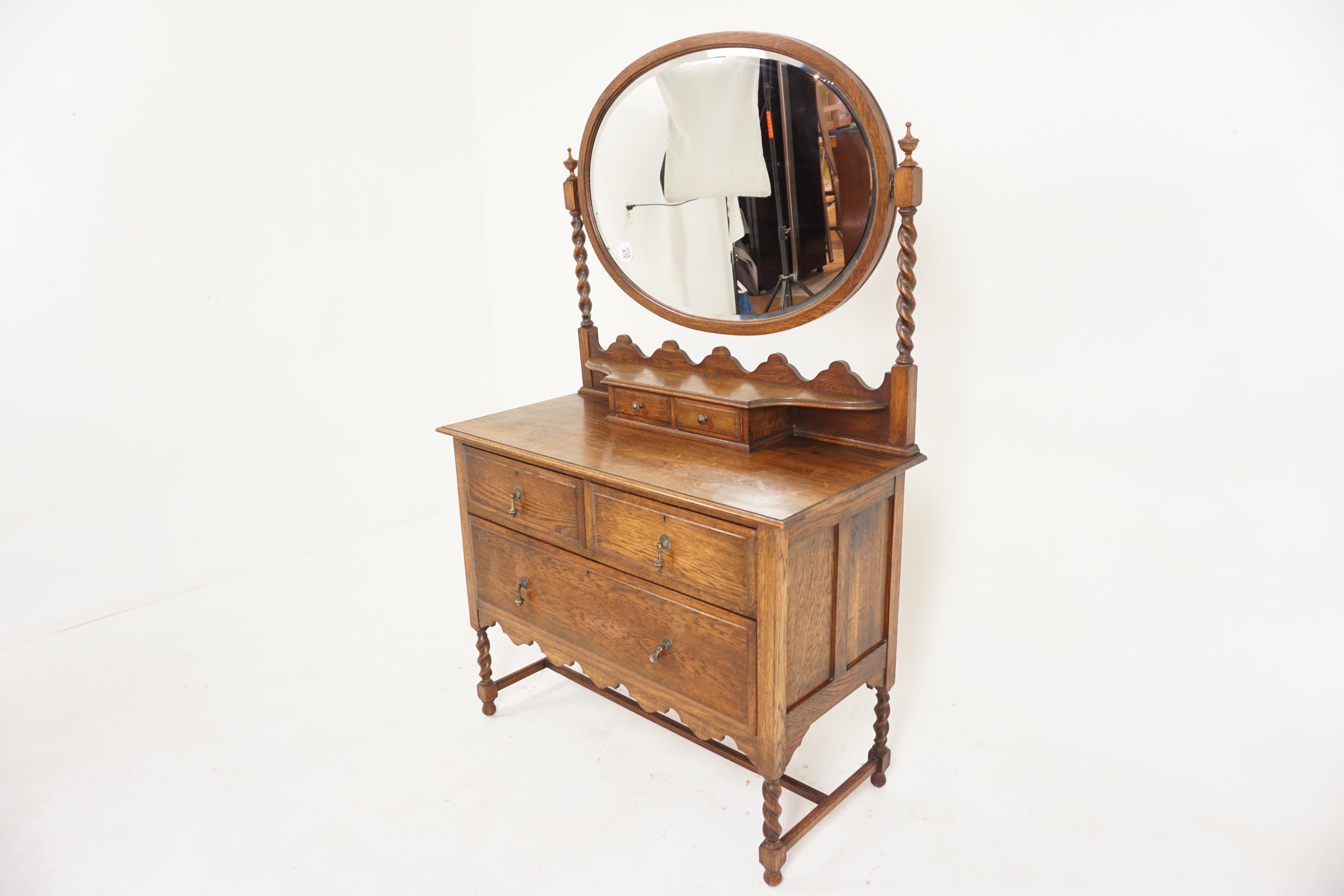 Arts + Crafts oak mirror back barley twist vanity, dresser, Scotland 1910, H783

Scotland 1910
Solid Oak
Original Finish
Framed bevelled oak mirror
Supported by a pair of barley twist uprights
Pair of small dovetailed drawers
Rectangular